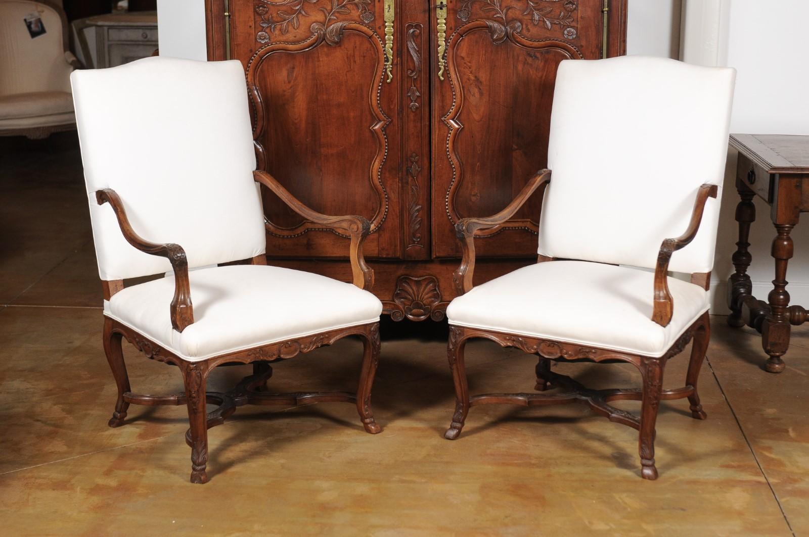 Pair of French Régence Style 19th Century Walnut Fauteuils with Carved Foliage 11