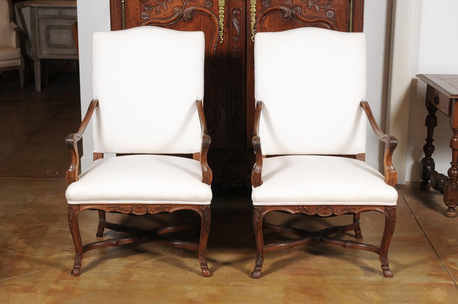 Pair of French Régence Style 19th Century Walnut Fauteuils with Carved Foliage 13