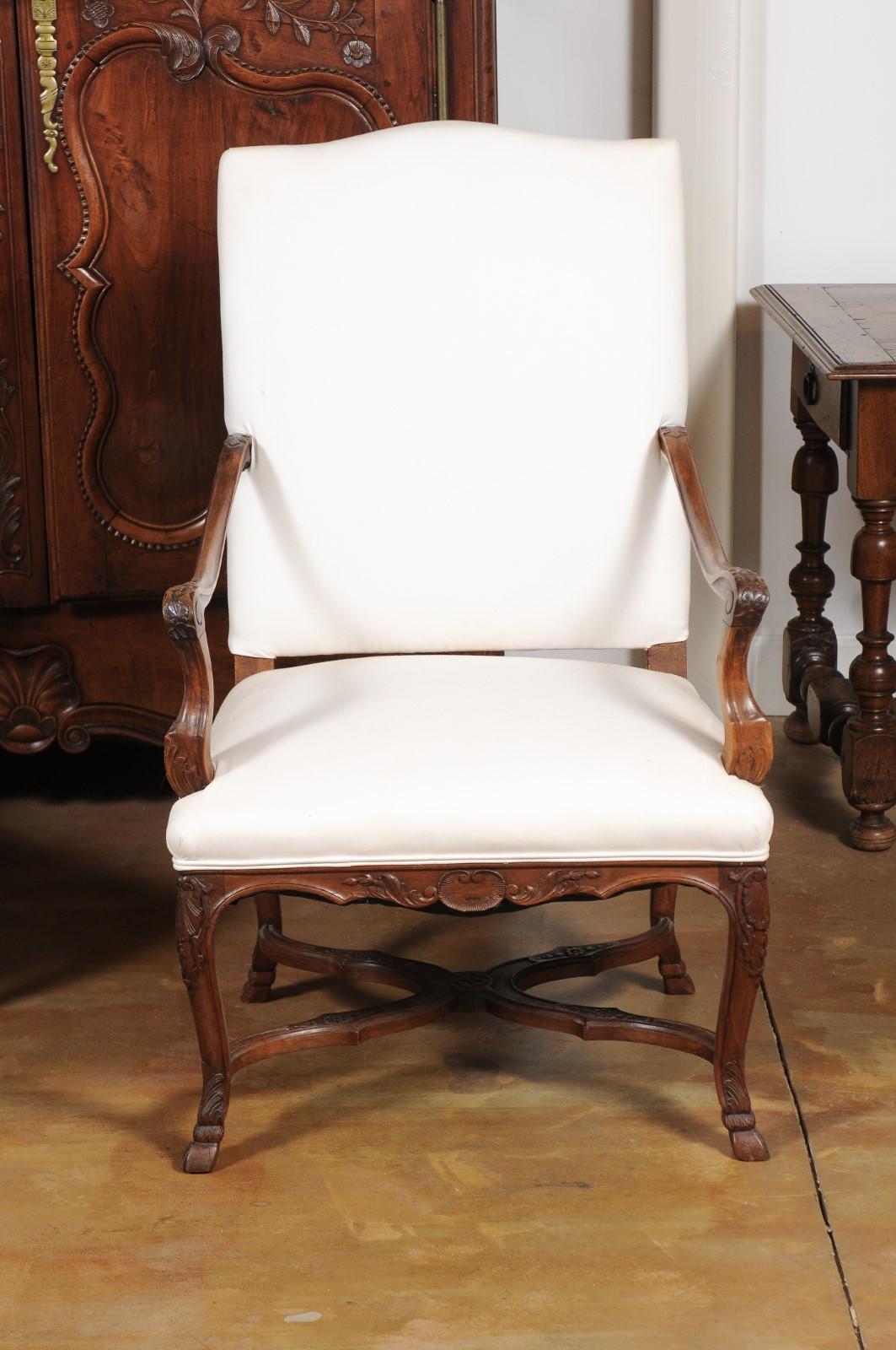 Pair of French Régence Style 19th Century Walnut Fauteuils with Carved Foliage 1