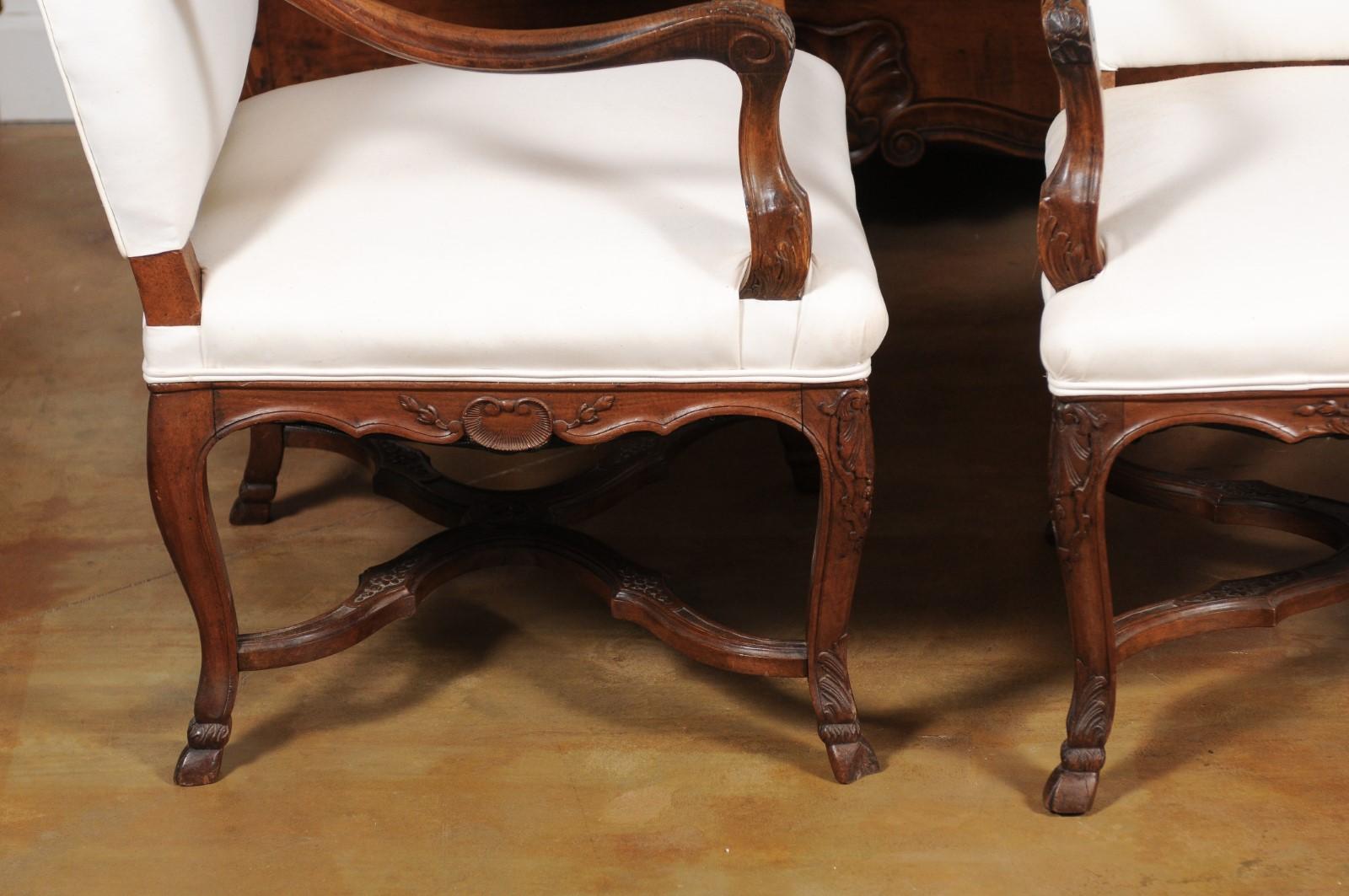 Pair of French Régence Style 19th Century Walnut Fauteuils with Carved Foliage 3