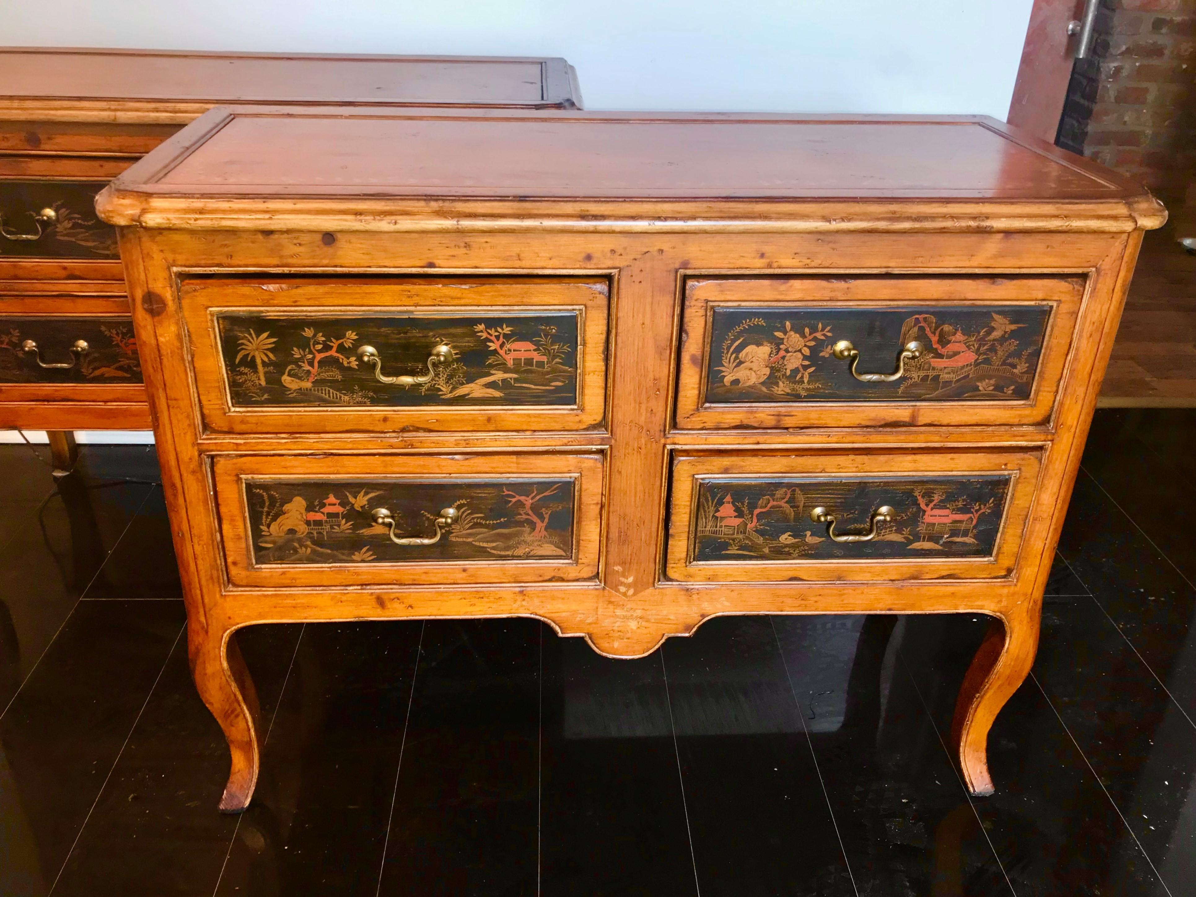 Of unusual French knotty pine and intentionally hand distressed .Each drawer with a very well done chinoiserie inset panel . Nice warm cognac color and patina . Distressed to give a warm provincial appeal . Thick , shaped beveled edges. The top and