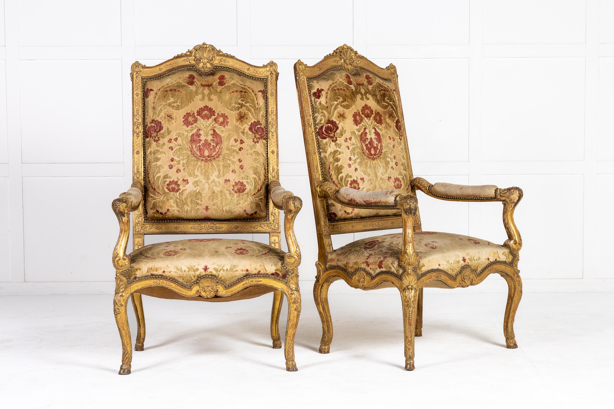 An Exeptional pair of French Regence Style giltwood armchairs c.1900

The chairs with upholstered seats, backs and arm pads with show frames centred on a finely carved shell on the crest rail. The front, back and side seat rails all serpentine with