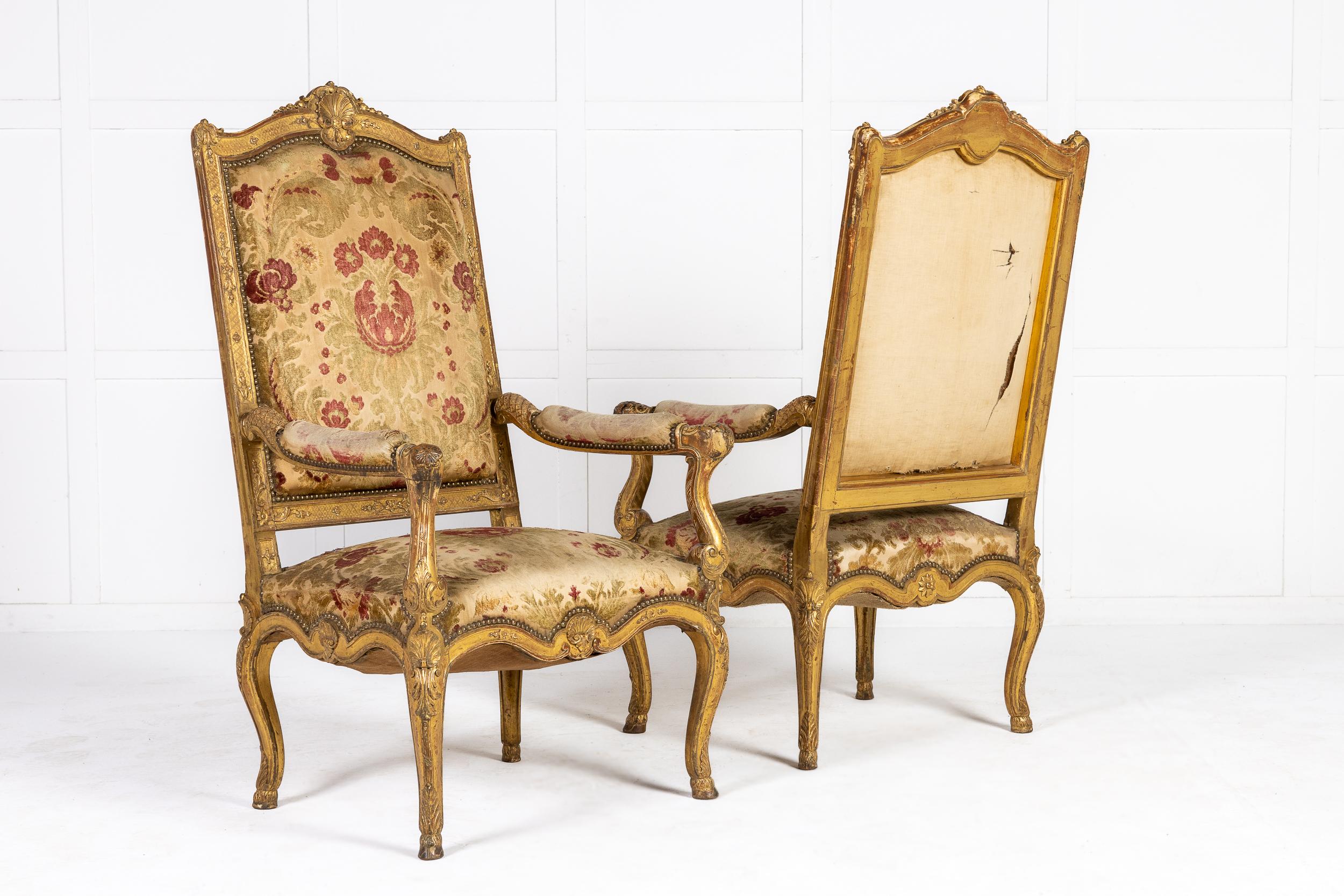 Early 20th Century Pair of French Regence Style Giltwood Armchairs For Sale