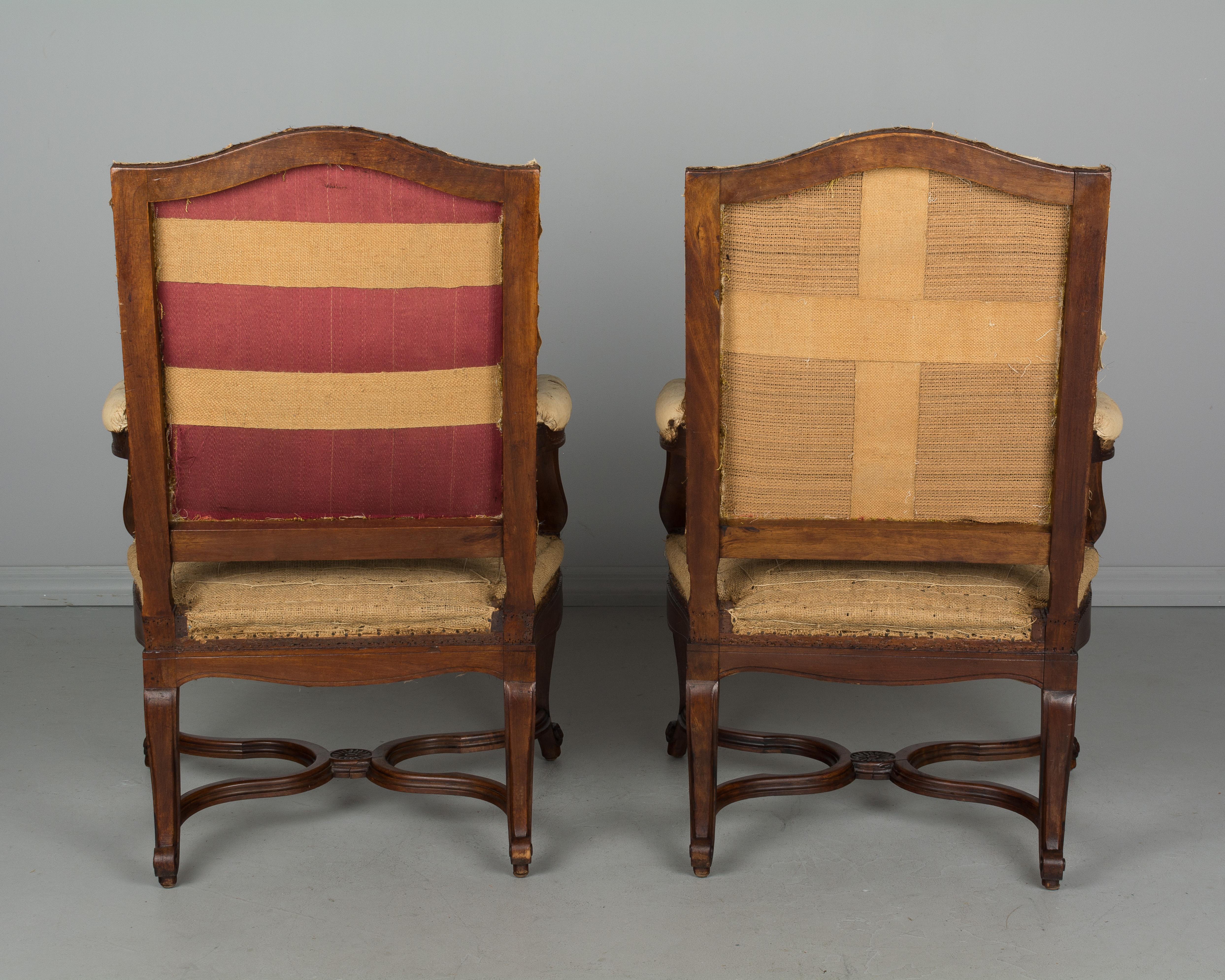 Hand-Carved Pair of French Regency Style Fauteuils