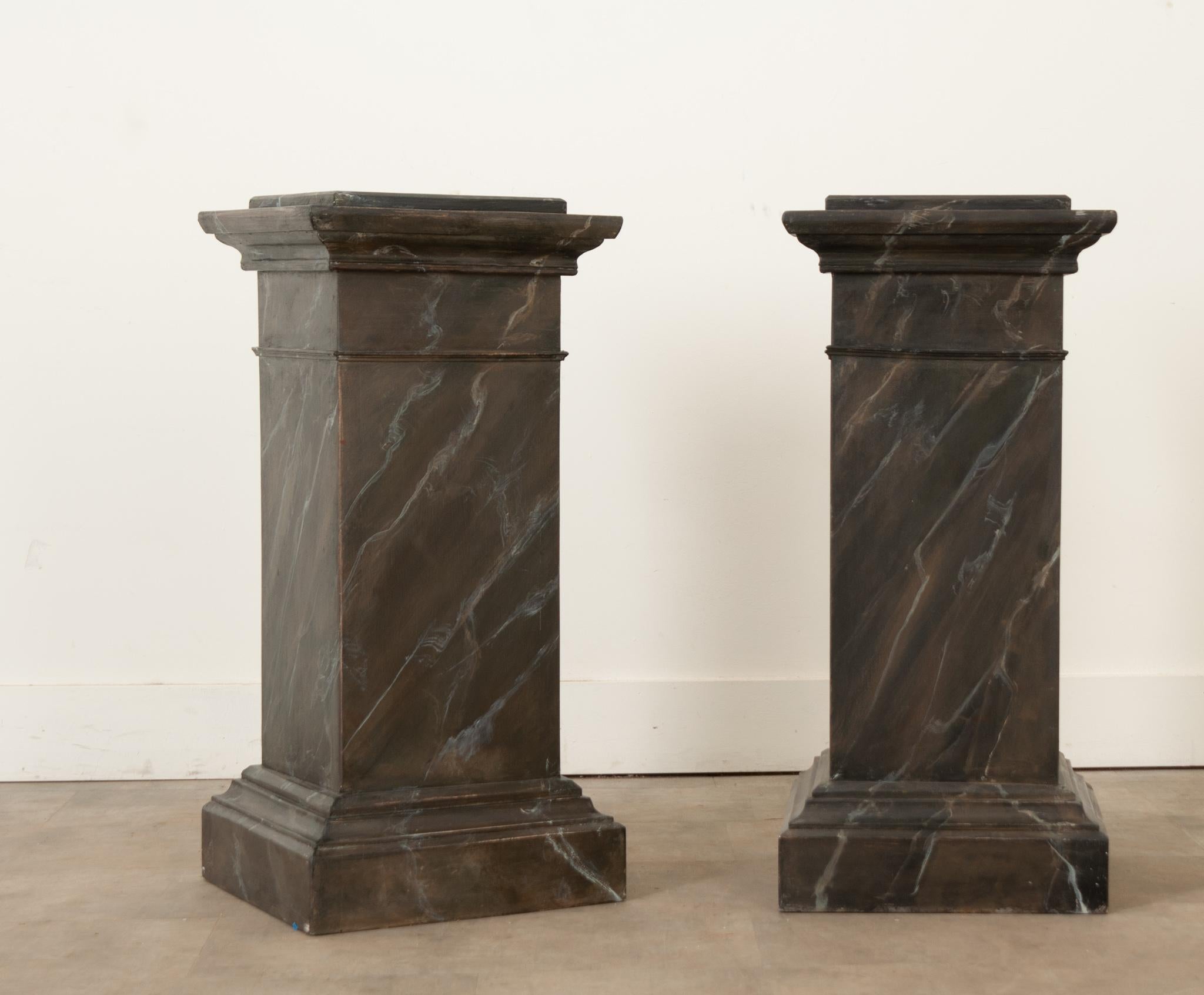 A pair of recently made poplar wood pedestals in a classical design. Faux painted marble in just the right color. Be sure to view the detailed images to see these works of art.