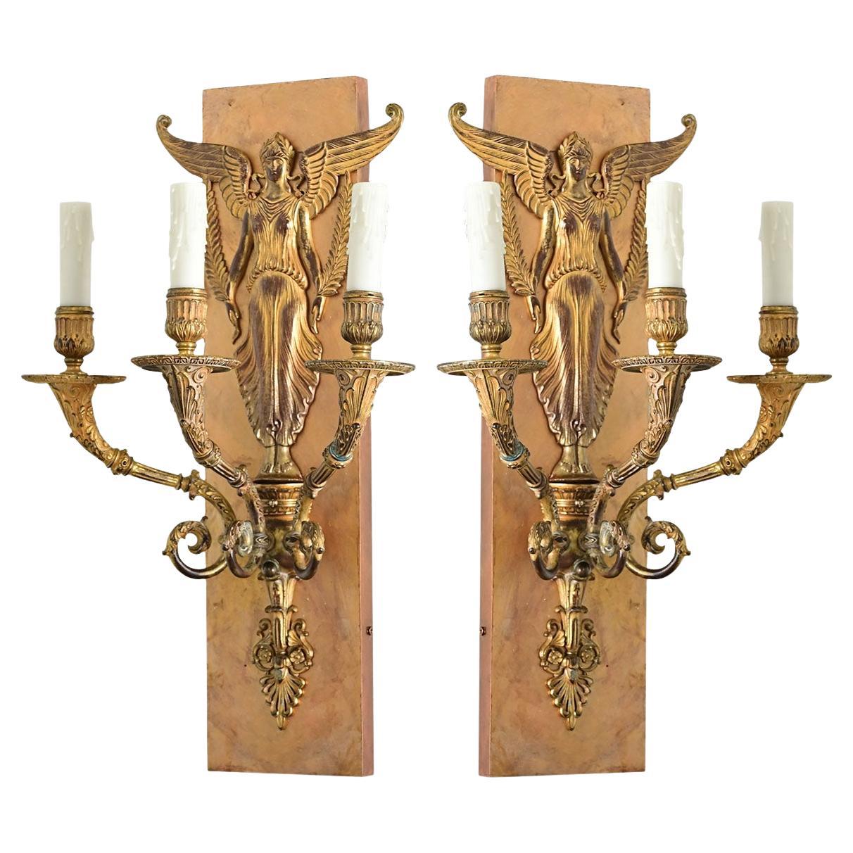 Pair of French Restauration Gilt Bronze Sconces For Sale