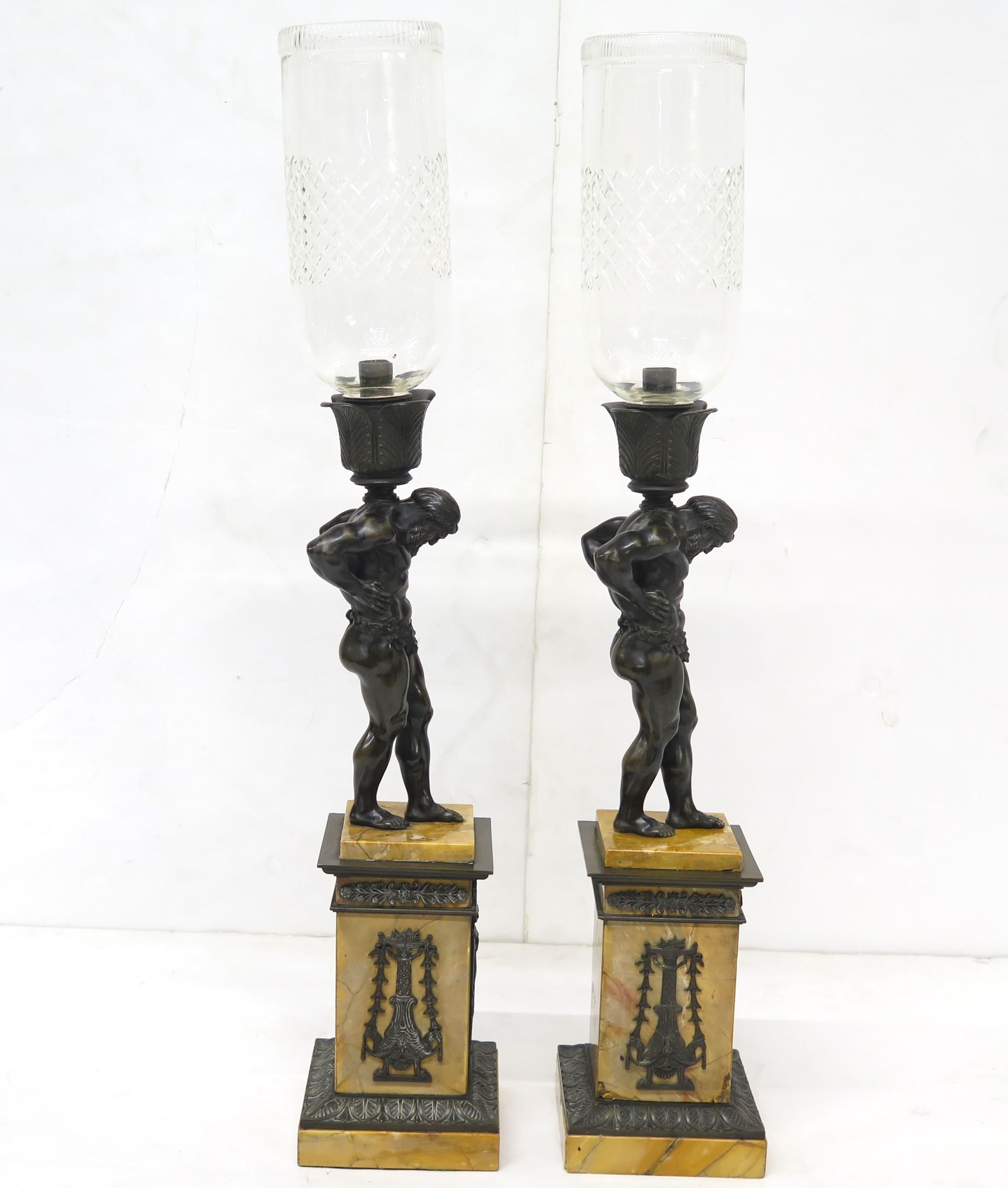 Pair of French Restoration Period Candlesticks of Patinated Bronze  In Good Condition For Sale In Dallas, TX