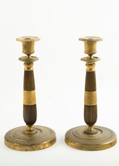 Pair of French Restoration Period Chased Gilt Bronze Candlesticks with Bobèches