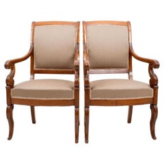 Pair of French Restoration Upholstered Mahogany Fauteuils