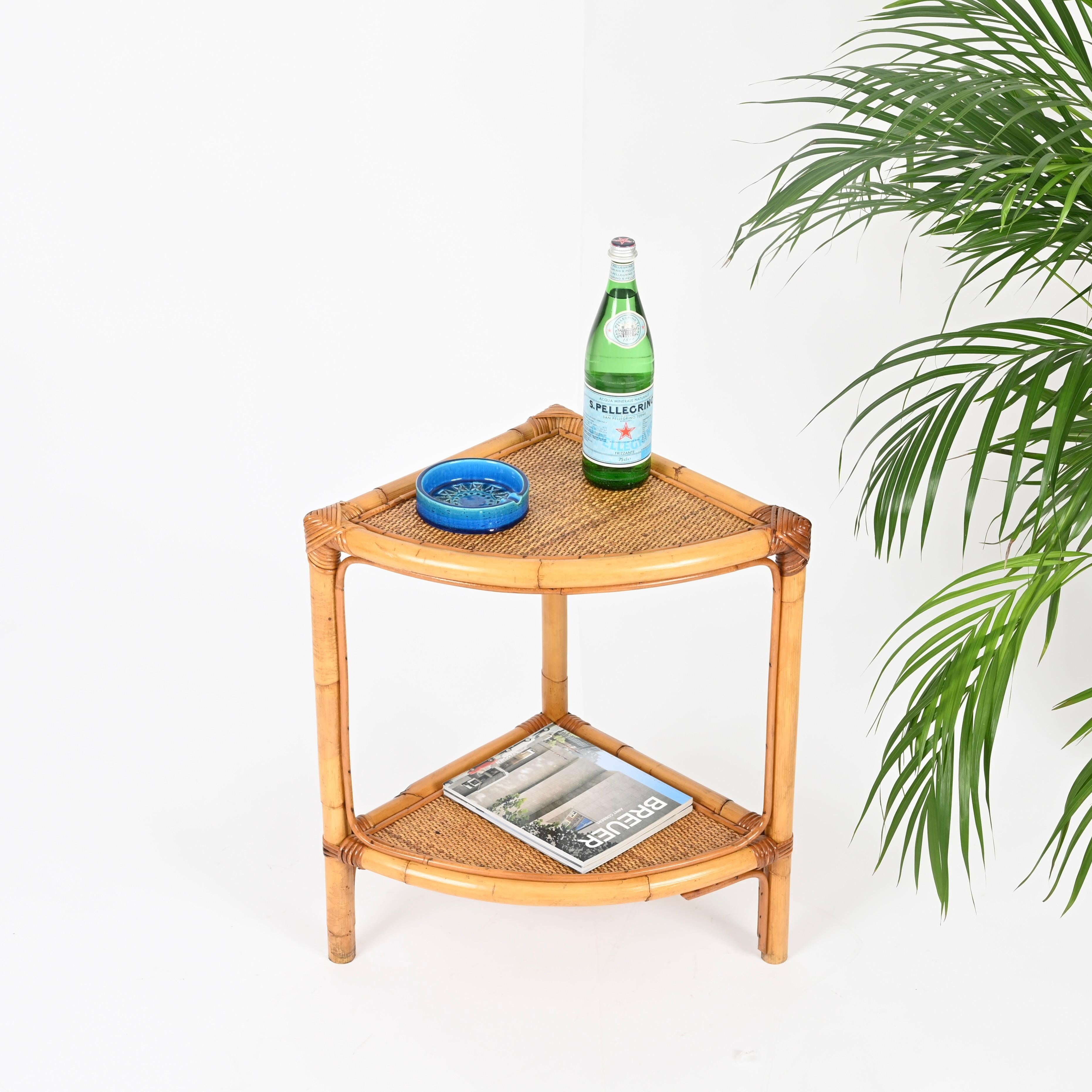 Wonderful pair of French Riviera style nightstands or side tables in bamboo, rattan, and woven wicker. These incredibly stylish and unique small tables were produced in Italy during the 1970s.

In fantastic condition and with a charming honey-toned