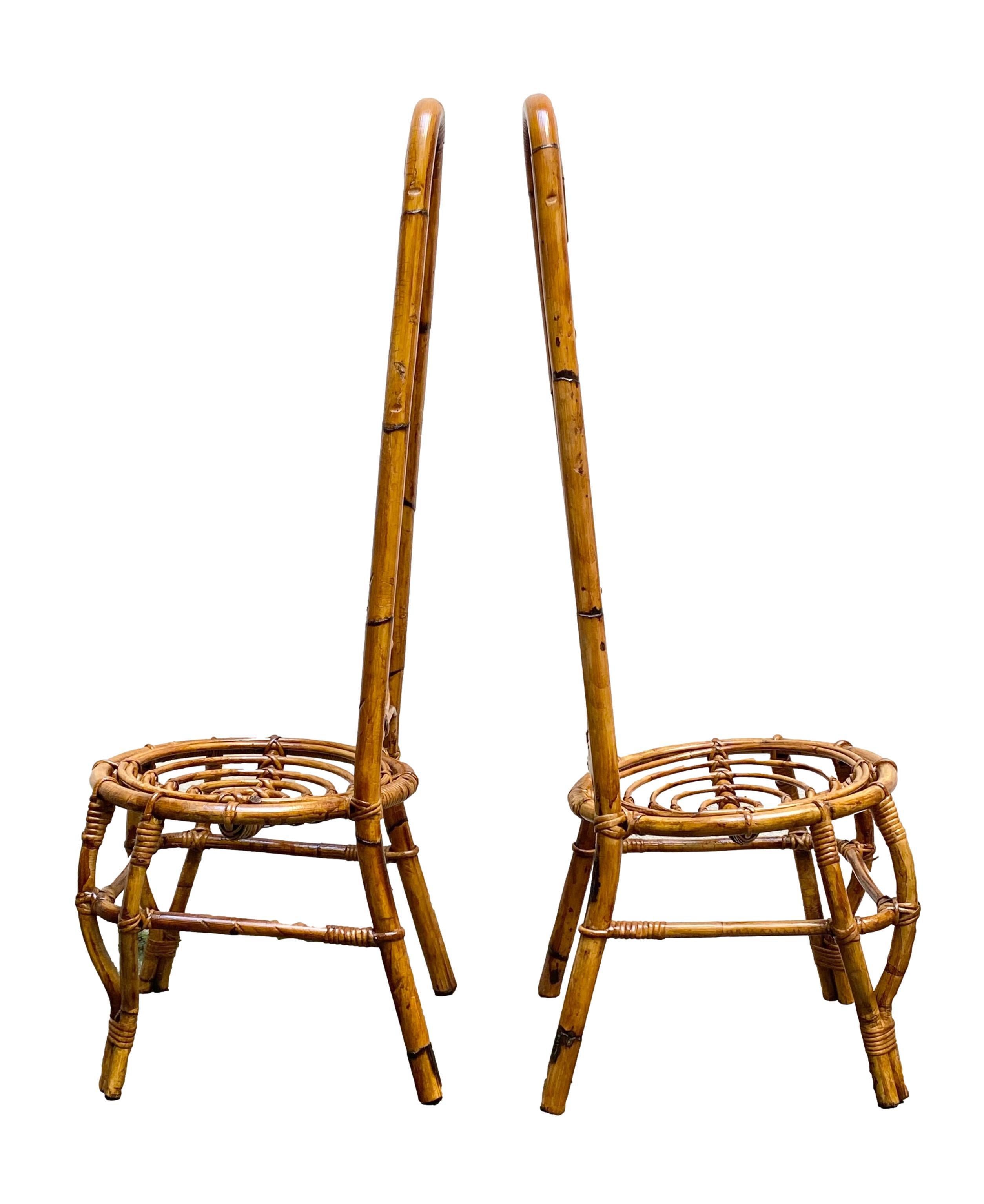 Pair of French Riviera bamboo and rattan dining or occasional chairs.
Excellent original condition.
