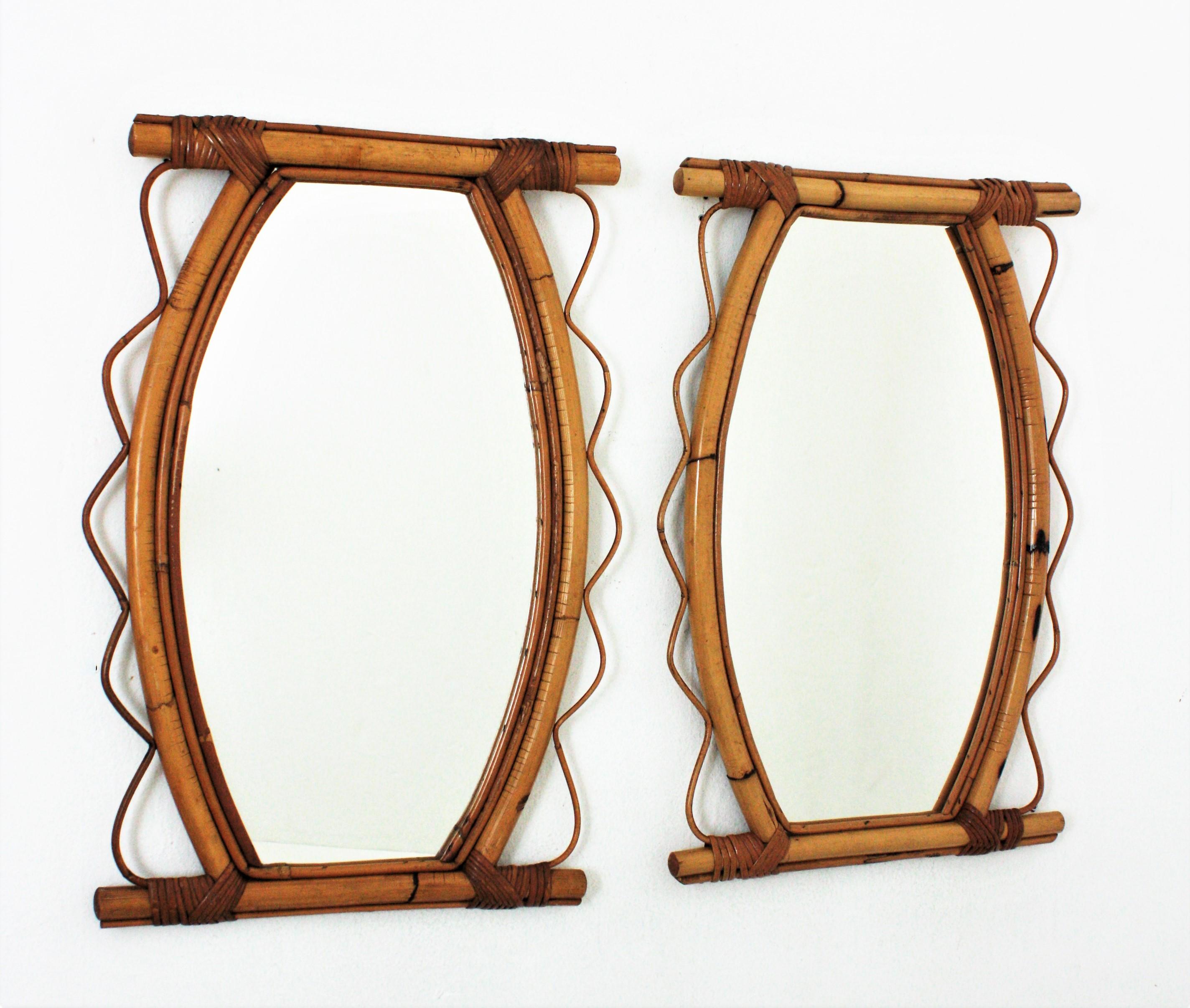 A pair of eye-catching handcrafted bamboo and rattan mirrors with scalloped detailing surrounding the frame. France, 1950s-1960s.
These Mediterranean wall mirrors feature a bamboo / thick rattan frame surrounded by jagged rattan details on both