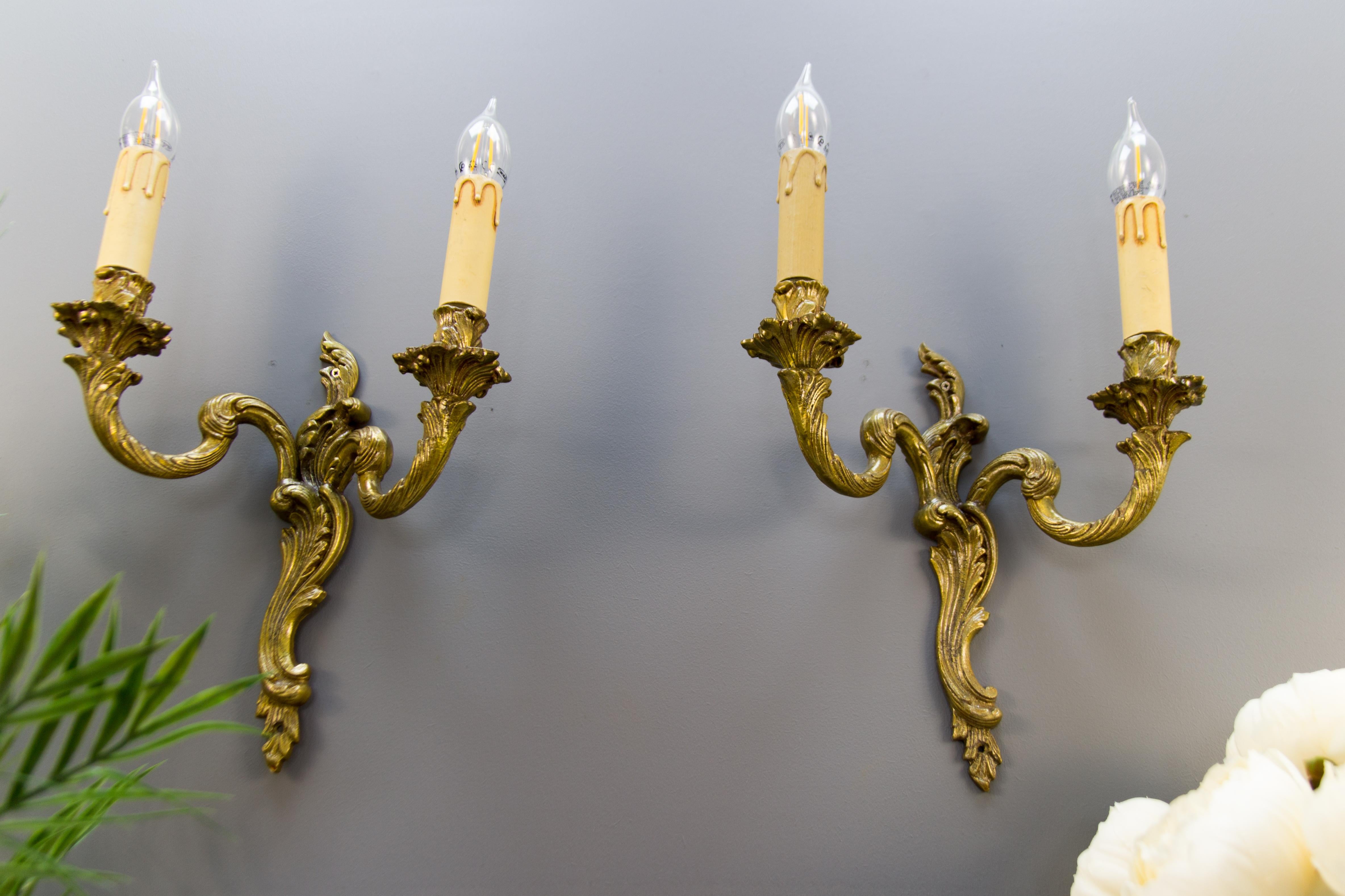 Louis XV Pair of French Rococo Style Bronze Twin Arm Wall Sconces