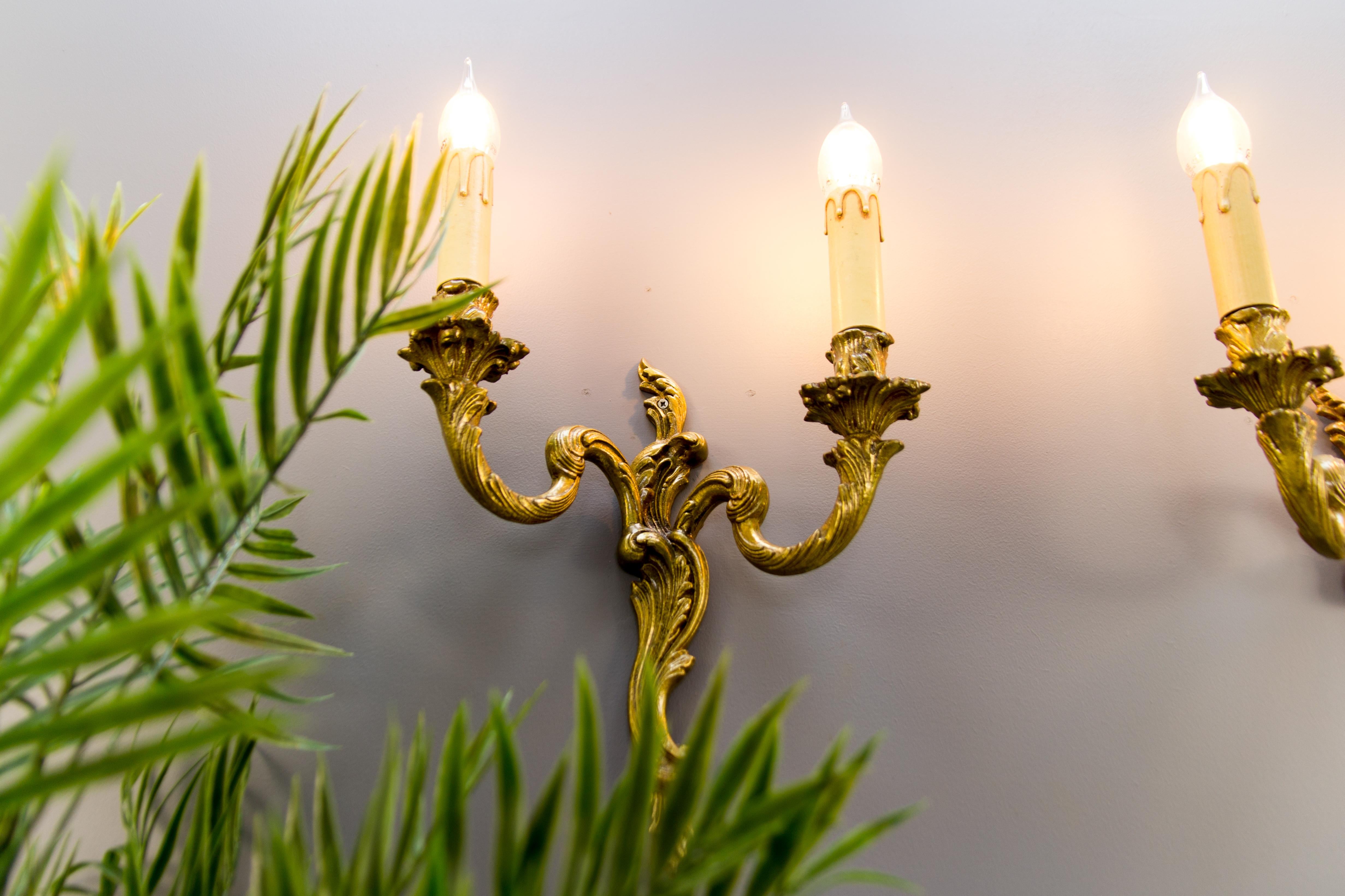 20th Century Pair of French Rococo Style Bronze Twin Arm Wall Sconces