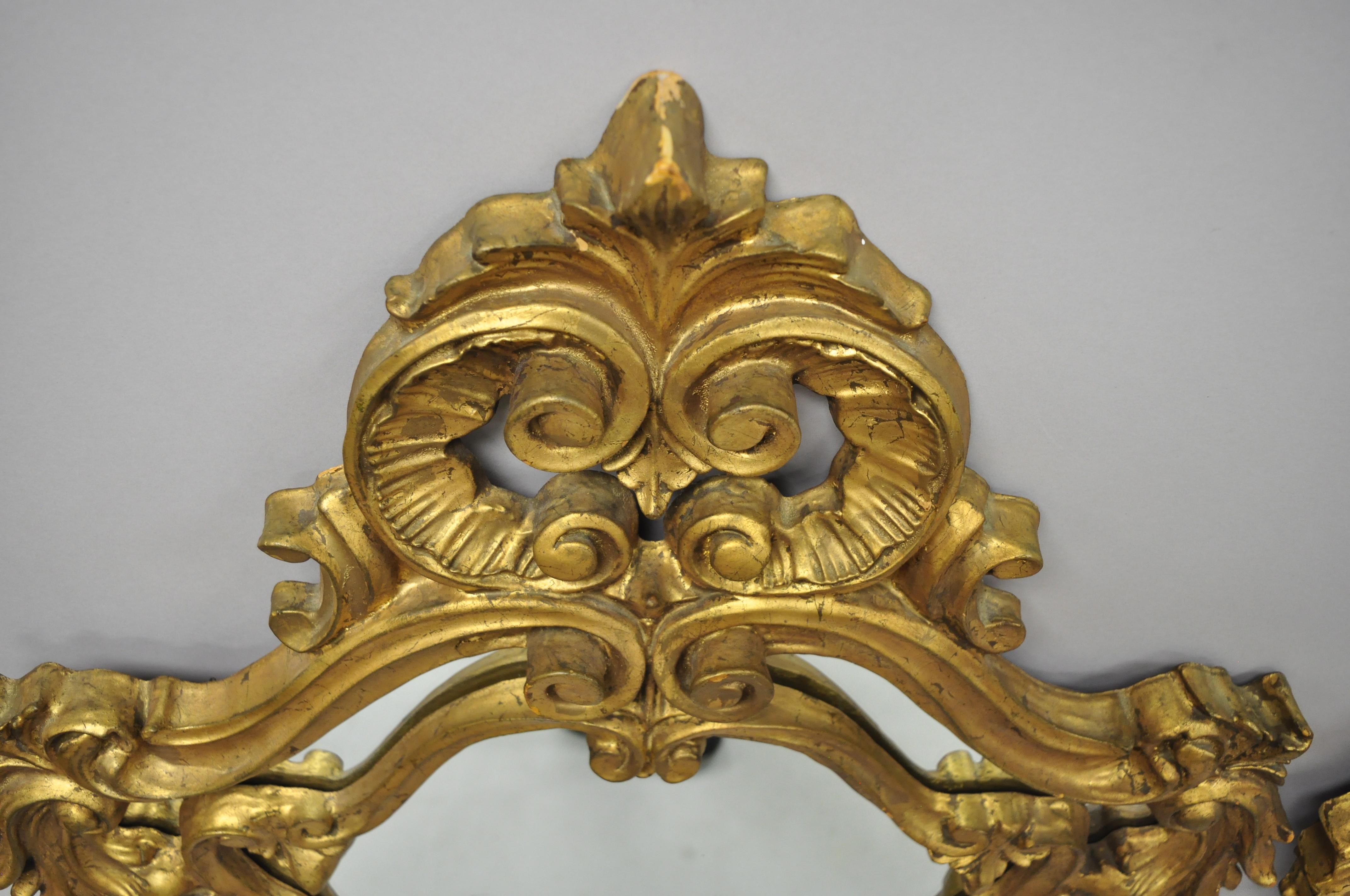 Pair of French Rococo Style Gold Wall Mirrors with Fancy Scroll Work In Good Condition In Philadelphia, PA