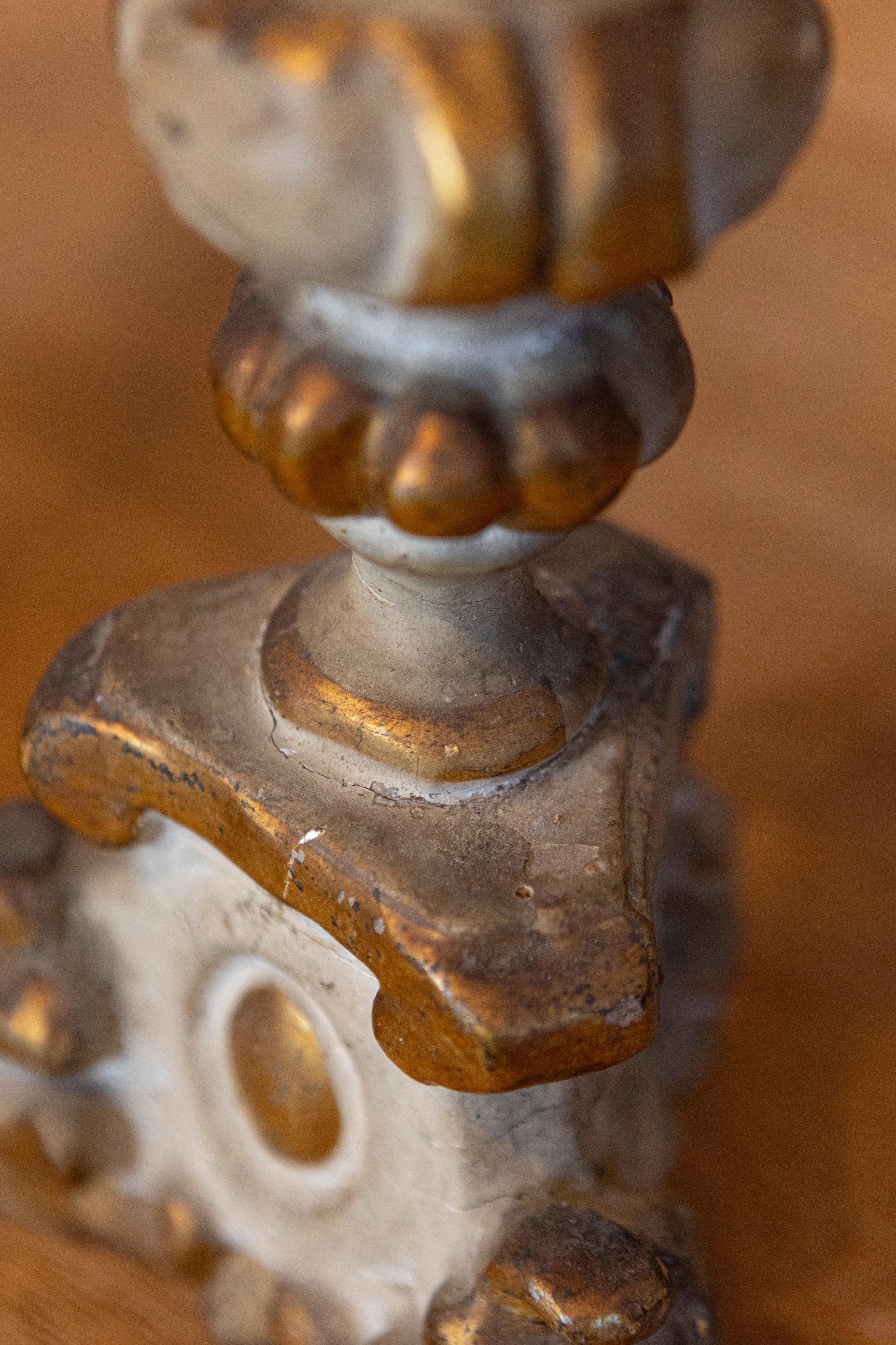 Pair of French Rococo Style Parcel Gilt Candlesticks with Carved Lion Paw Feet 1