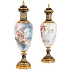 Pair of French Rococo Style Porcelain and Gilt Bronze Vases