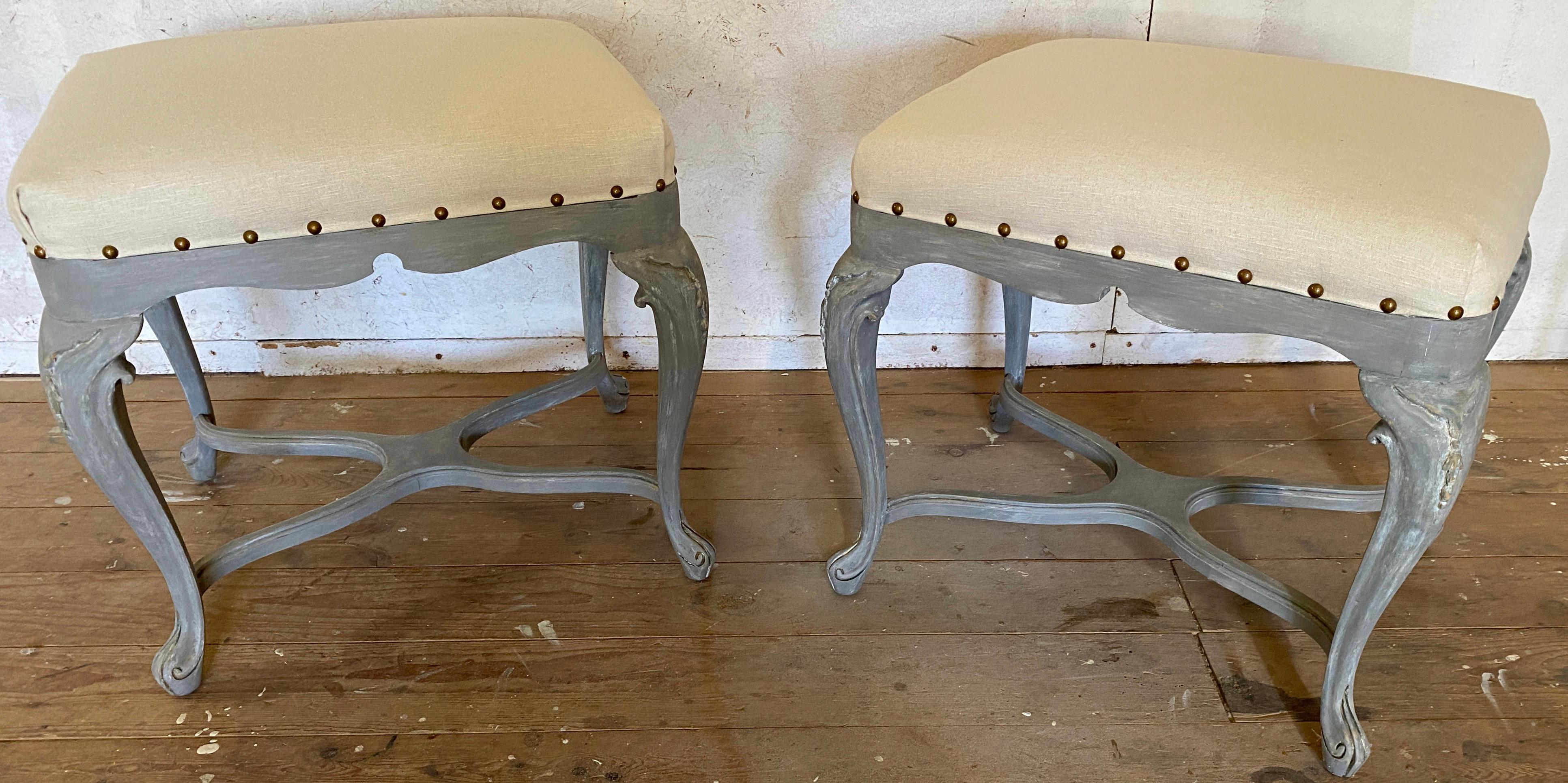 Pair of French Louis XV style painted side tables or stools with upholstered top. Use as stools for extra seating. Rococo Style grey painted tables or stools, vanity stool or chair.
Search terms: Swedish Gustavian style, Italian rococo.
 