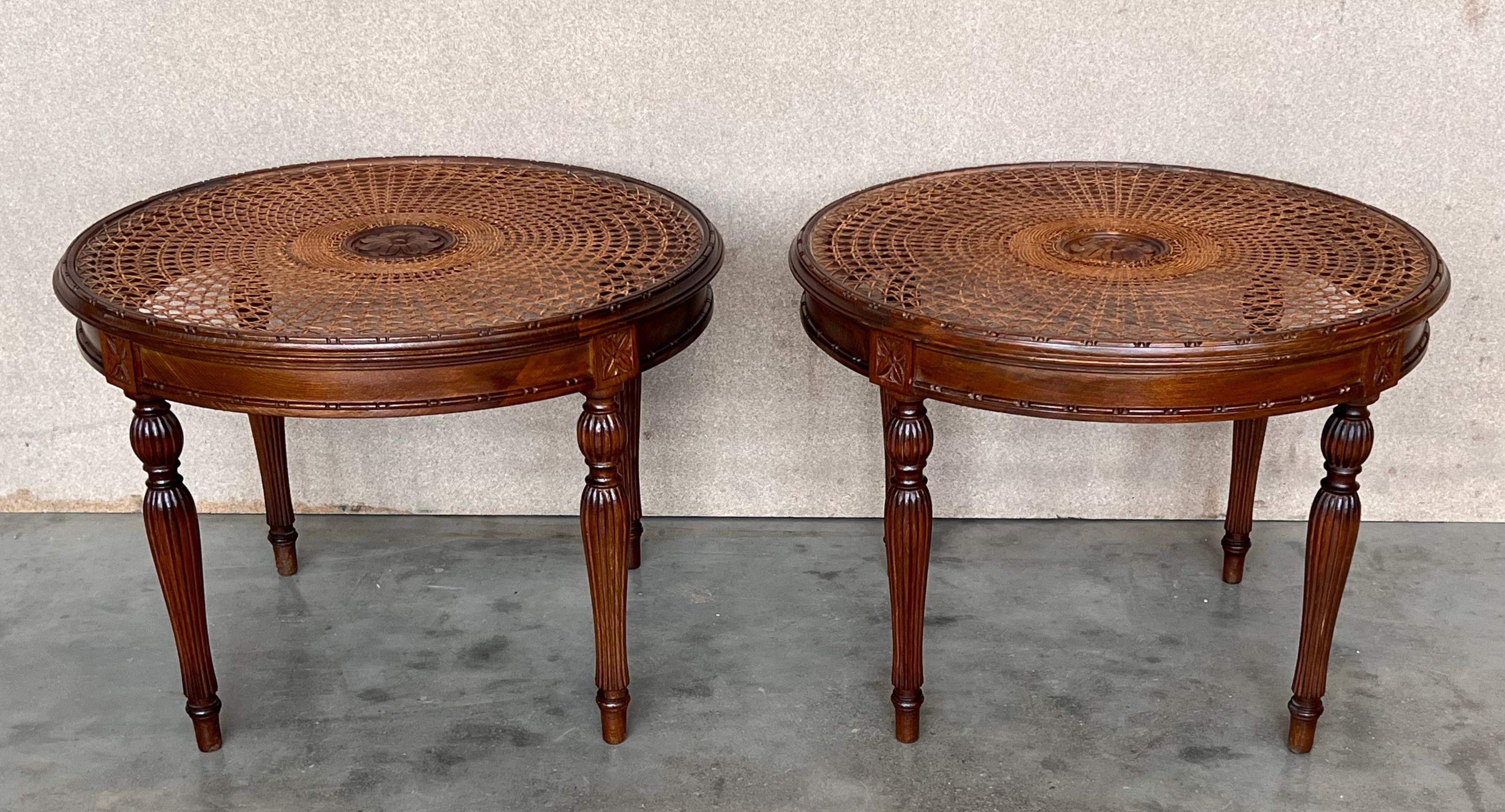 Mid-Century Modern Pair of French Round Side or Coffee tables with wicker top and carved legs