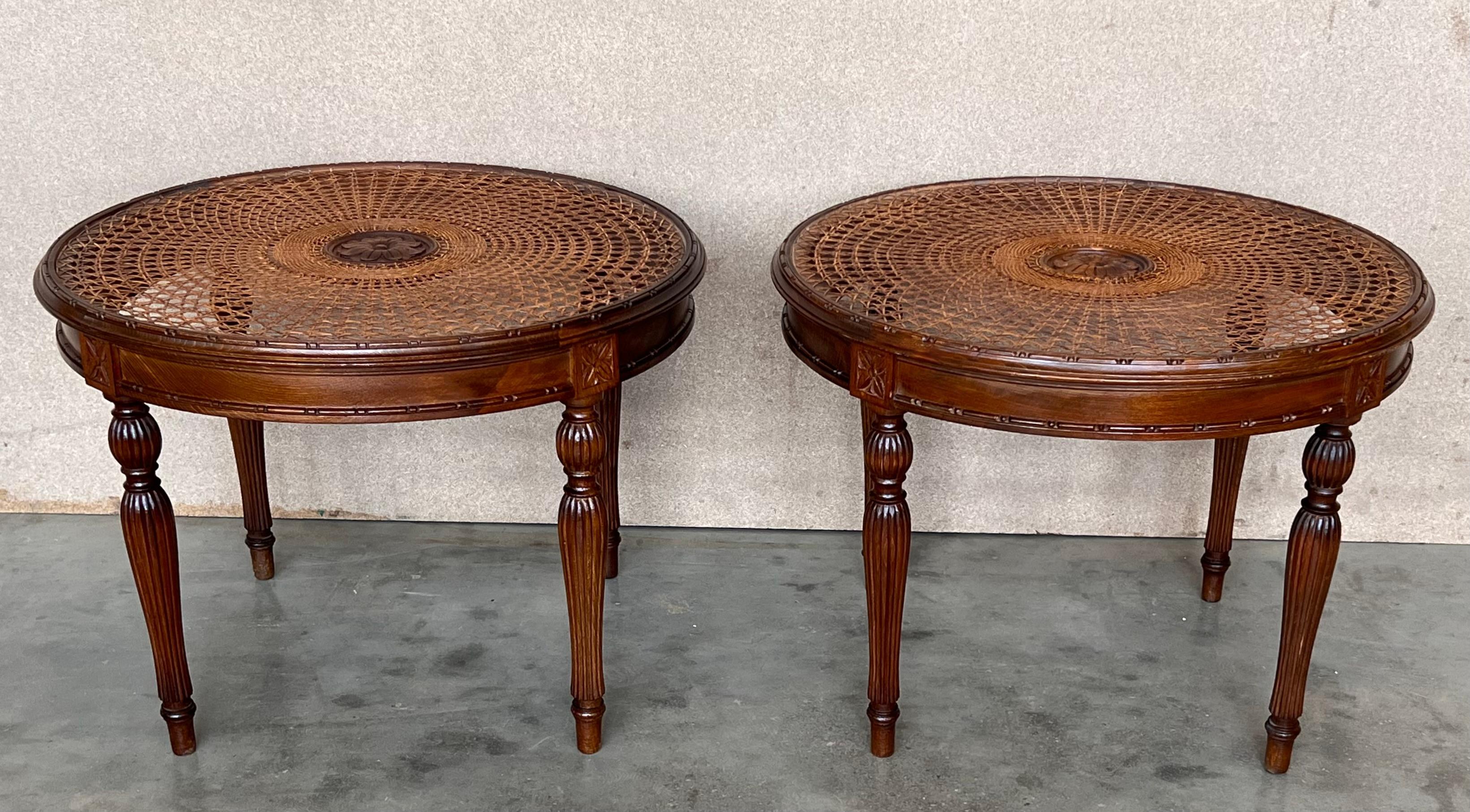 Pair of French Round Side or Coffee tables with wicker top and carved legs In Good Condition For Sale In Miami, FL