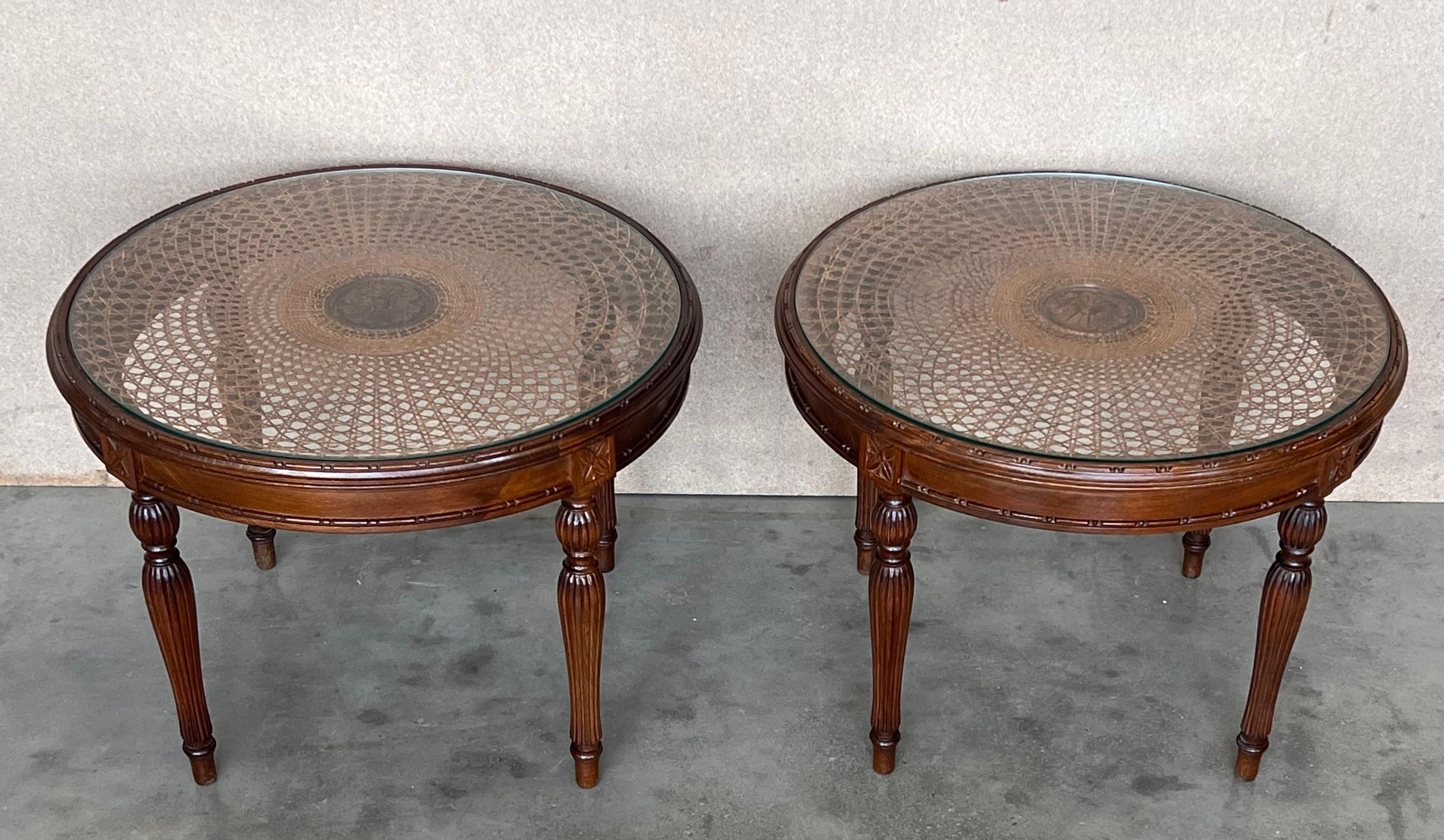 Glass Pair of French Round Side or Coffee tables with wicker top and carved legs For Sale