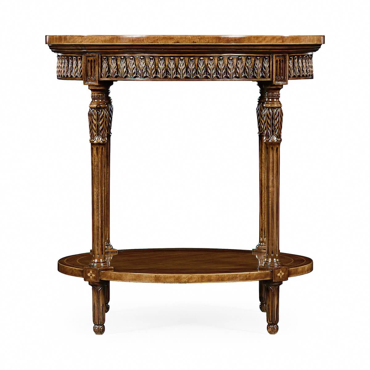 French Louis XVI style round end table with cross banded inlaid top, hand-carved acanthus leaf apron and acanthus wrapped turned, tapered and fluted legs. With an inlaid shelf stretcher base.

Dimensions: 24