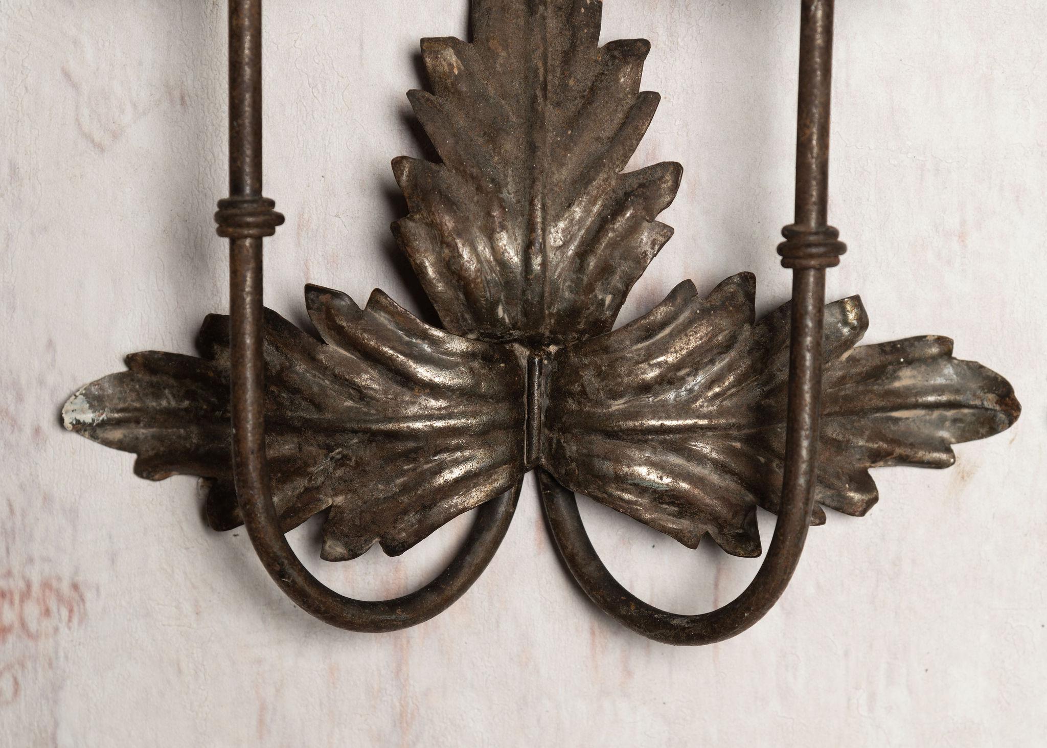 Pair of French tole sconces.

Currently for candles, these could be rewired. 
