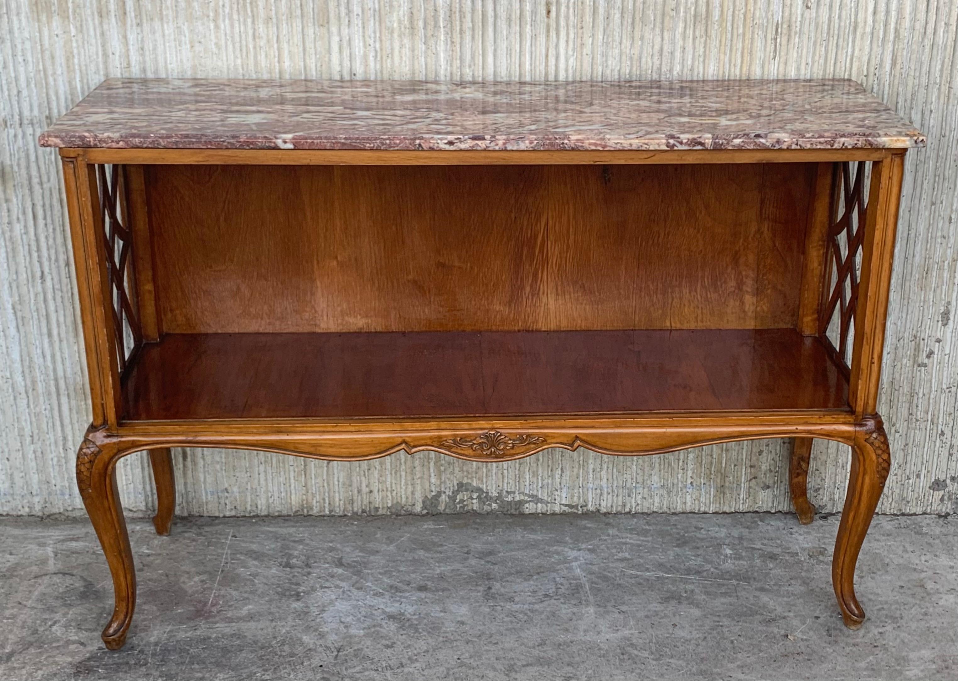 From a French estate to you, this stunning antique French carved server is loaded with carved features and quality craftsmanship!. Carved wide panels on each side and beautiful and cabriole carved legs.
It has a marble top in perfect shape.
 