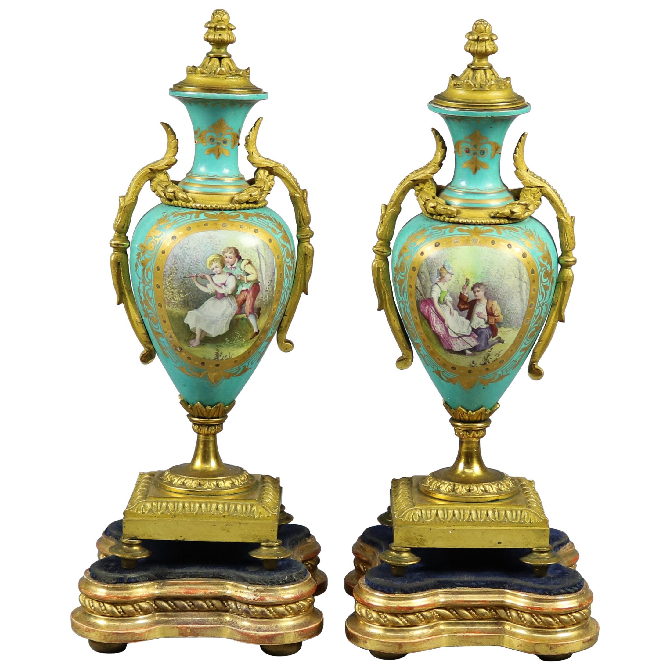 Pair of French Sevres Hand Painted & Gilt Porcelain & Bronze Pictorial Urns