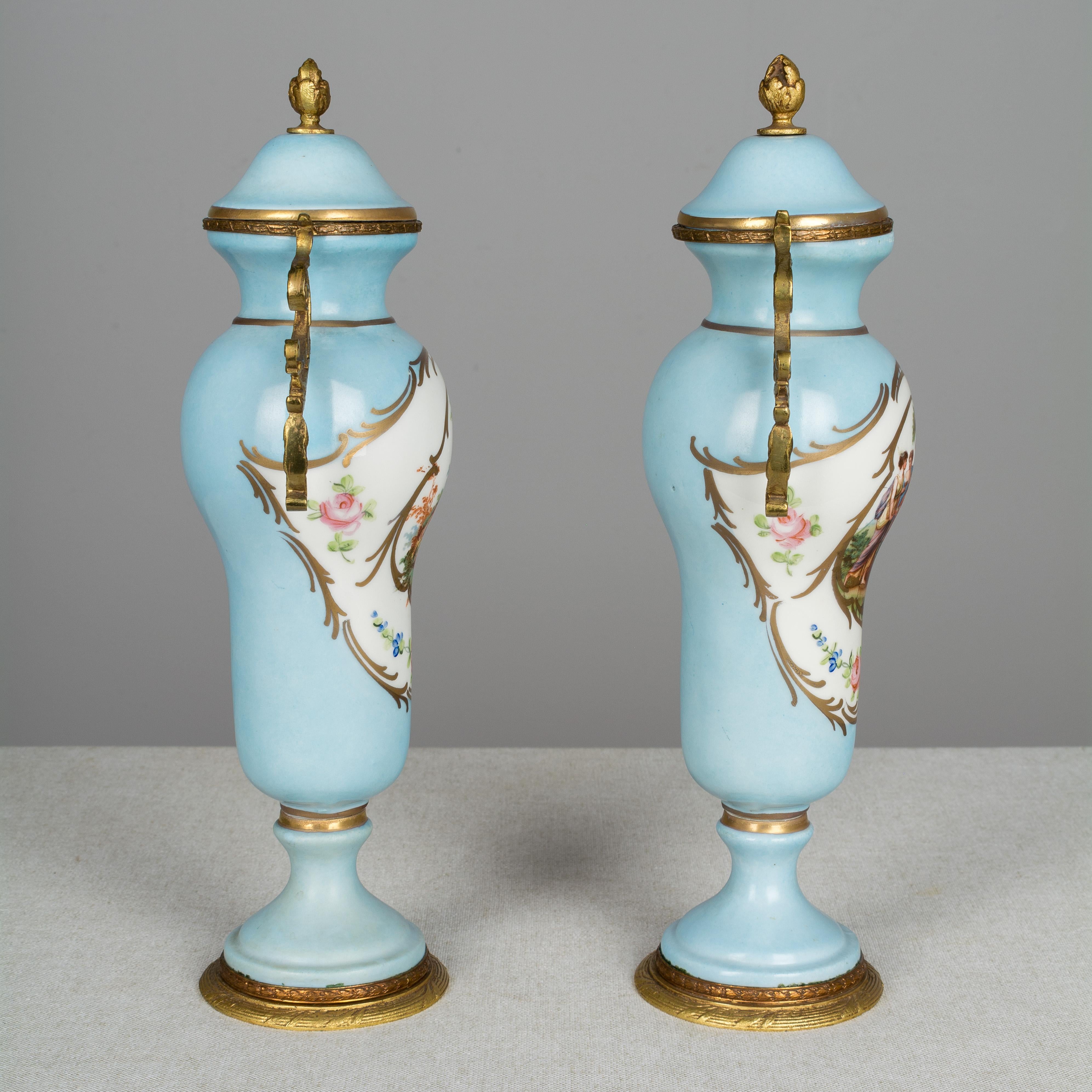 French Provincial Pair of French Sèvres Porcelain Urns