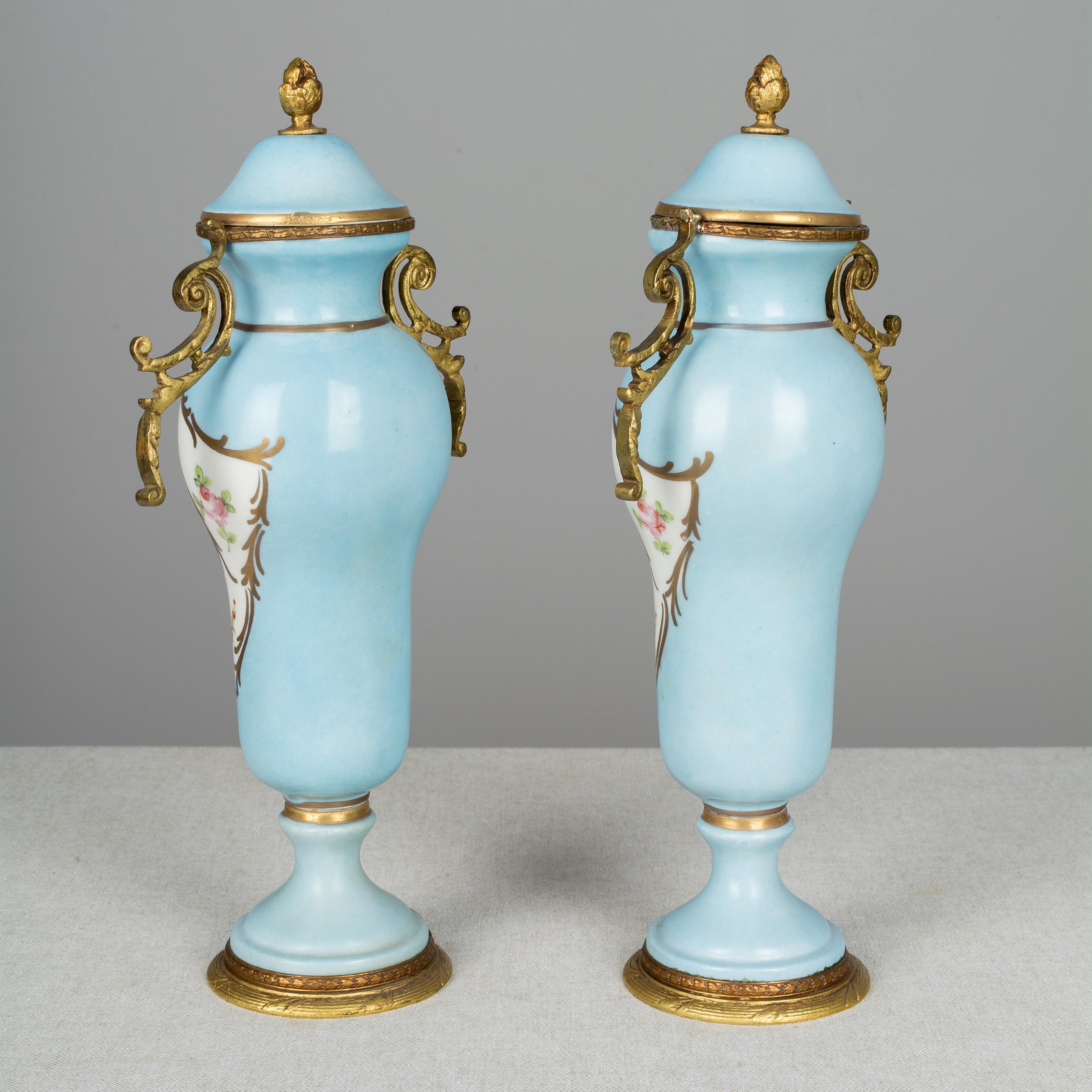 Pair of French Sèvres Porcelain Urns 1