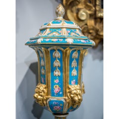 Pair of French Sèvres Style Gilded Porcelain Vases with Lion Heads