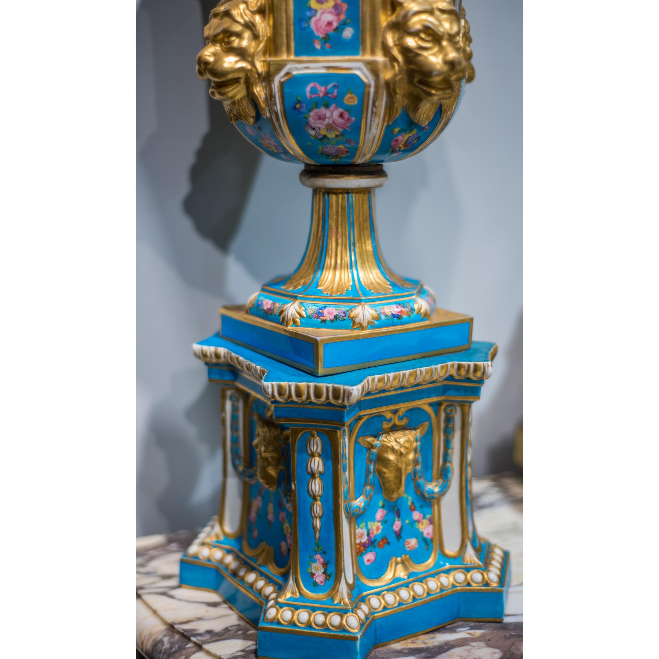 Gilt Pair of French Sèvres Style Gilded Porcelain Vases with Lion Heads For Sale