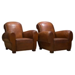 Pair of French Sheep Hide Rollback Club Chairs, circa 1940
