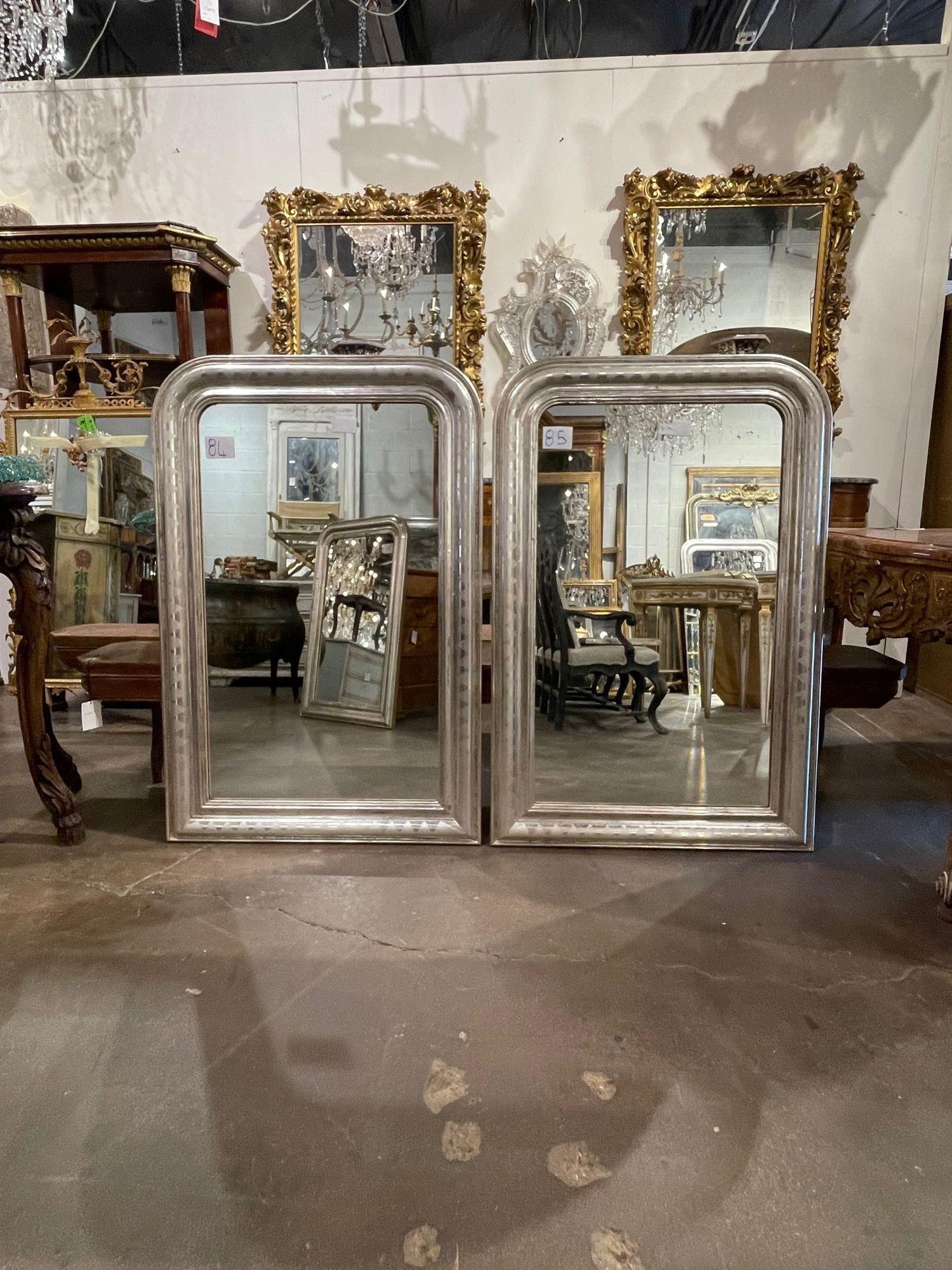 Very nice pair of French silver leaf Louis Philippe mirrors with geometric pattern. Creates an upscale polished look for a variety of decors. So pretty!!