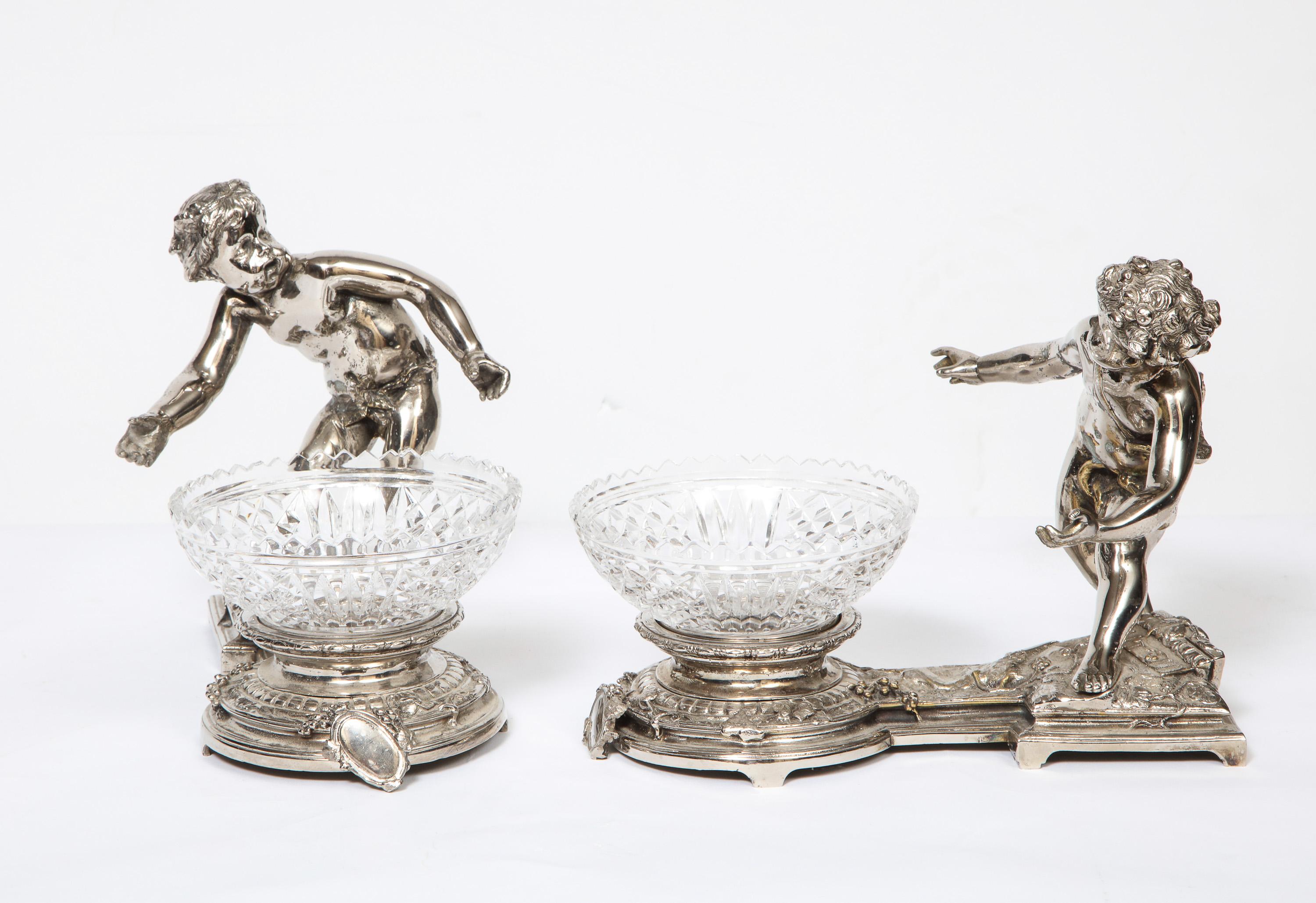 Pair of French Silvered Bronze and Glass Centerpieces with Cherubs In Good Condition In New York, NY