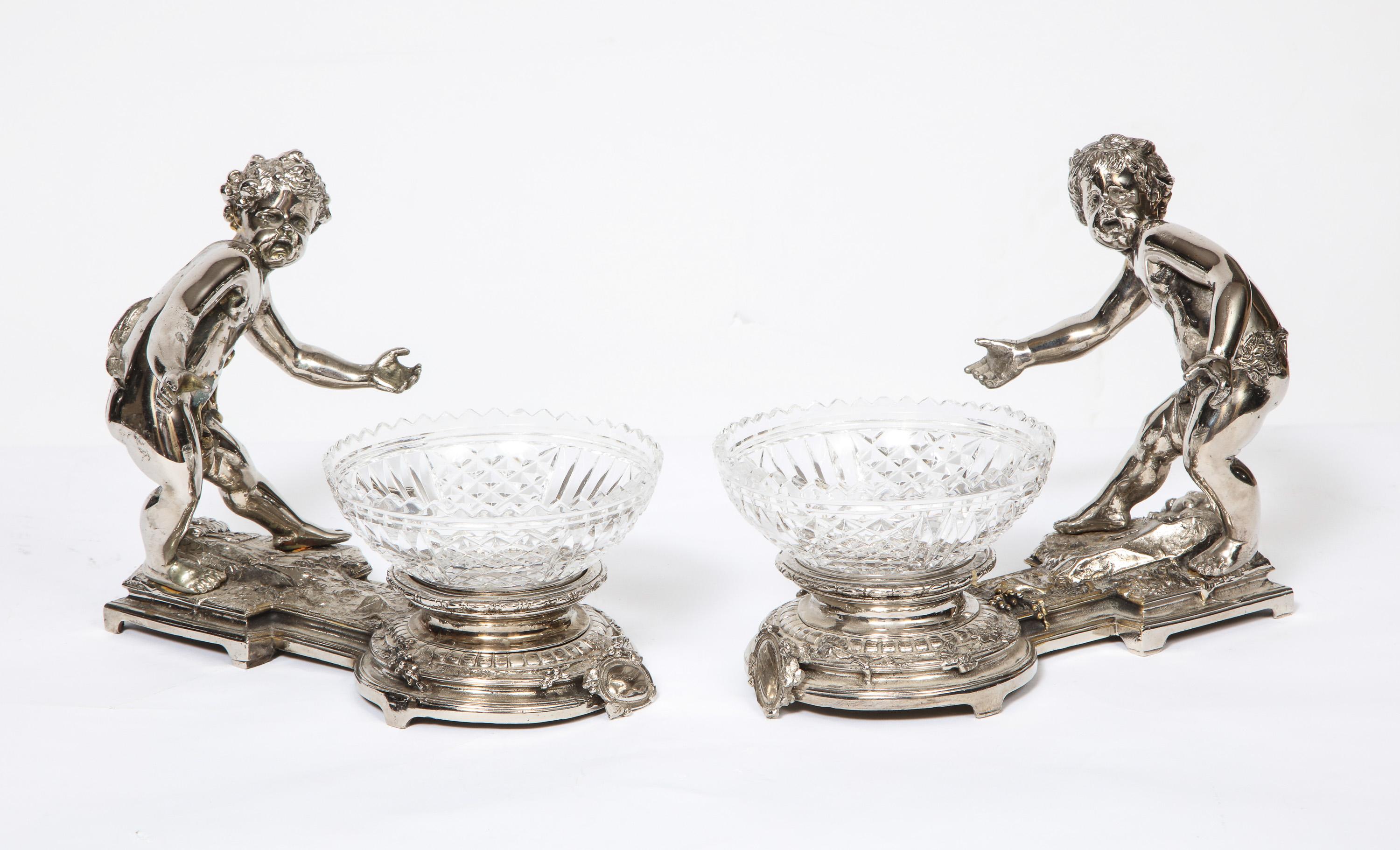 20th Century Pair of French Silvered Bronze and Glass Centerpieces with Cherubs