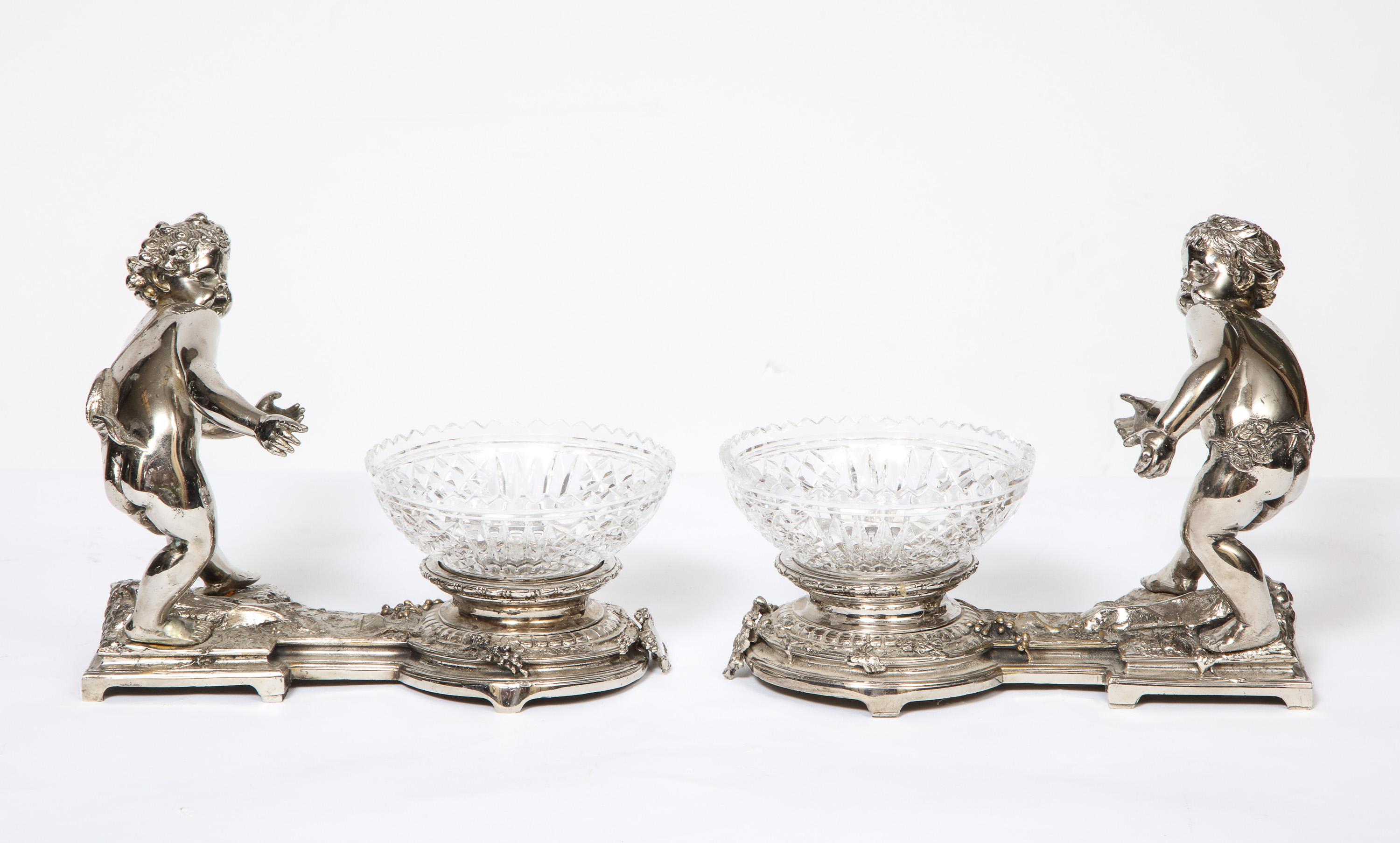 Pair of French Silvered Bronze and Glass Centerpieces with Cherubs 1
