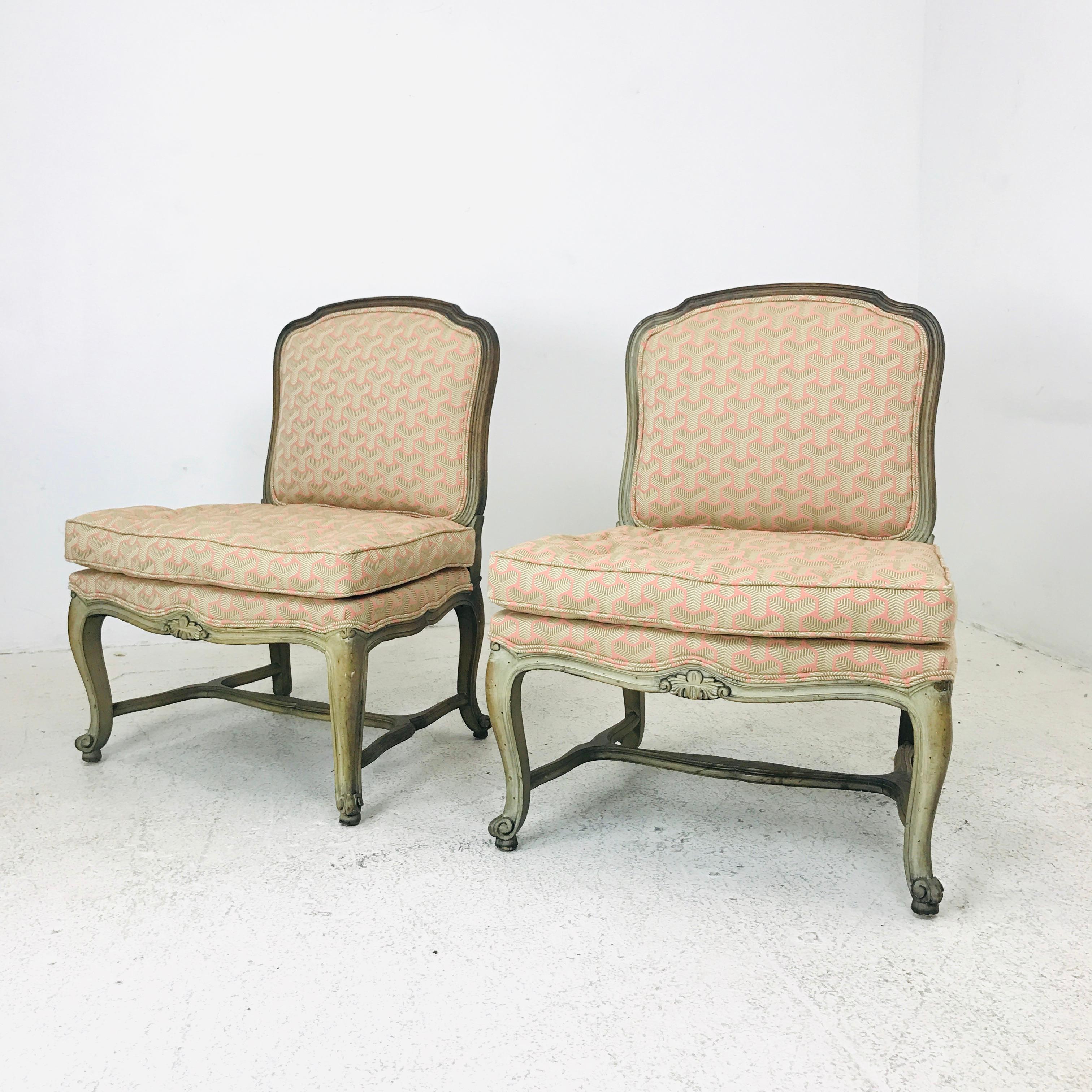 Pair of newly upholstered French slipper chairs.