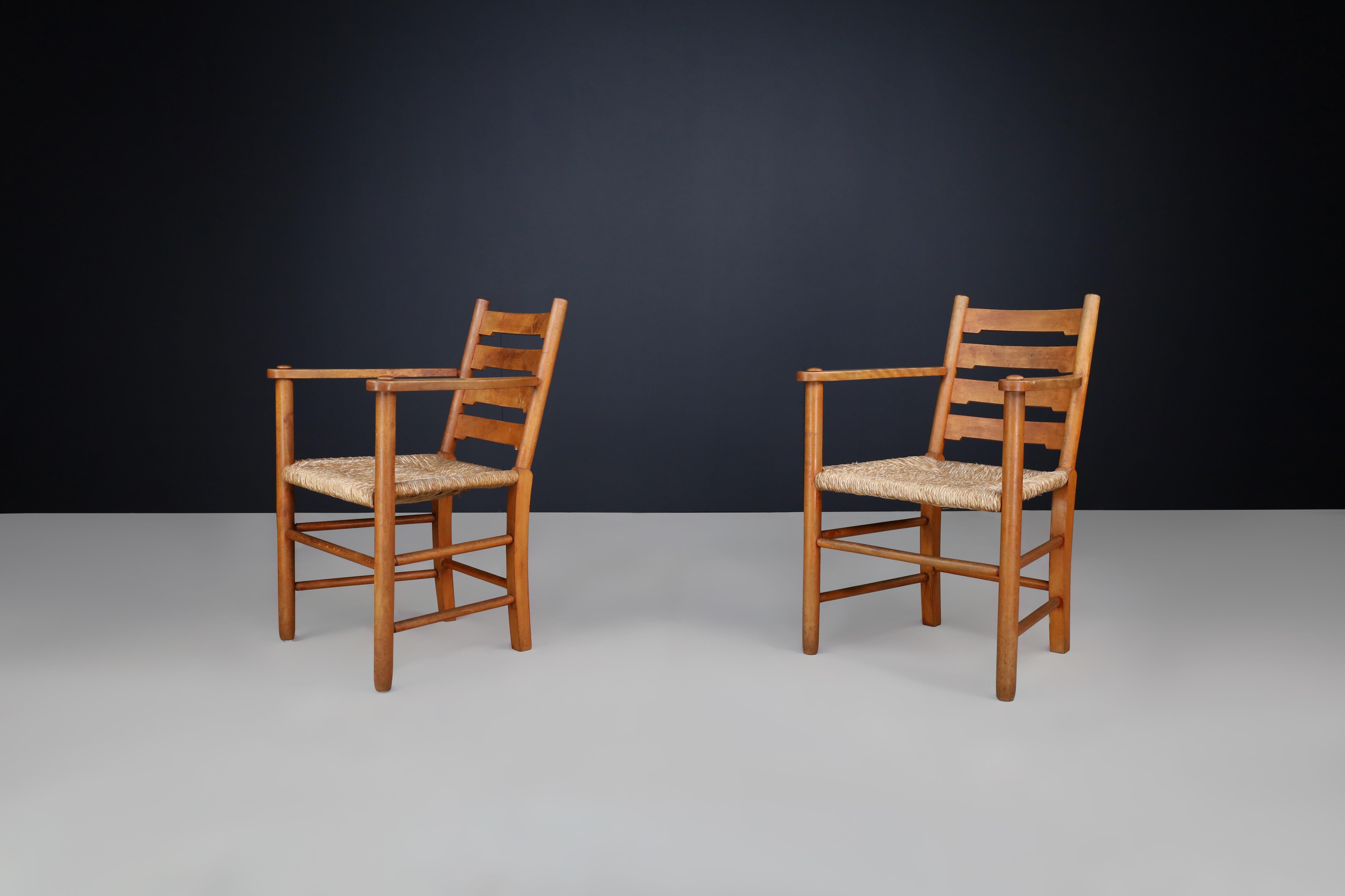 20th Century Pair of French Solid Beech Ladder-Back Armchairs with Rush Seats, France, 1950s For Sale