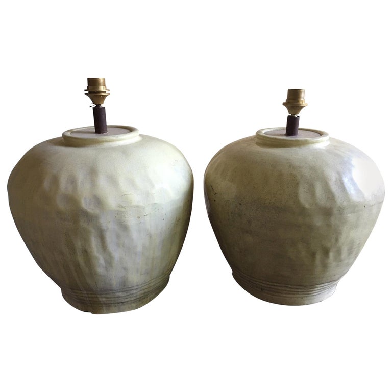 Pair of French Stoneware Yellow Jars Adapted as Lamps, 20th Century For
