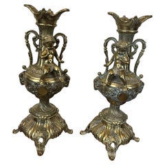 Pair of French Style Bronze Figural Candlesticks with Cherubs