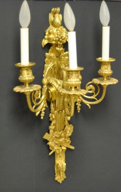 Pair of French Style Bronze Three-Arm Gold Dore Sconces Fruit and Floral Details