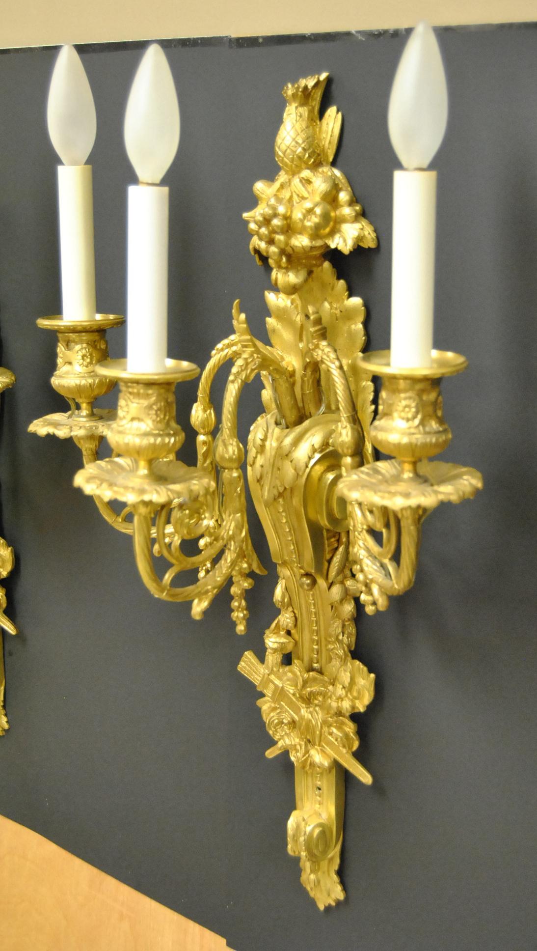 Unknown Pair of French Style Bronze Three-Arm Gold Dore Sconces Fruit and Floral Details For Sale