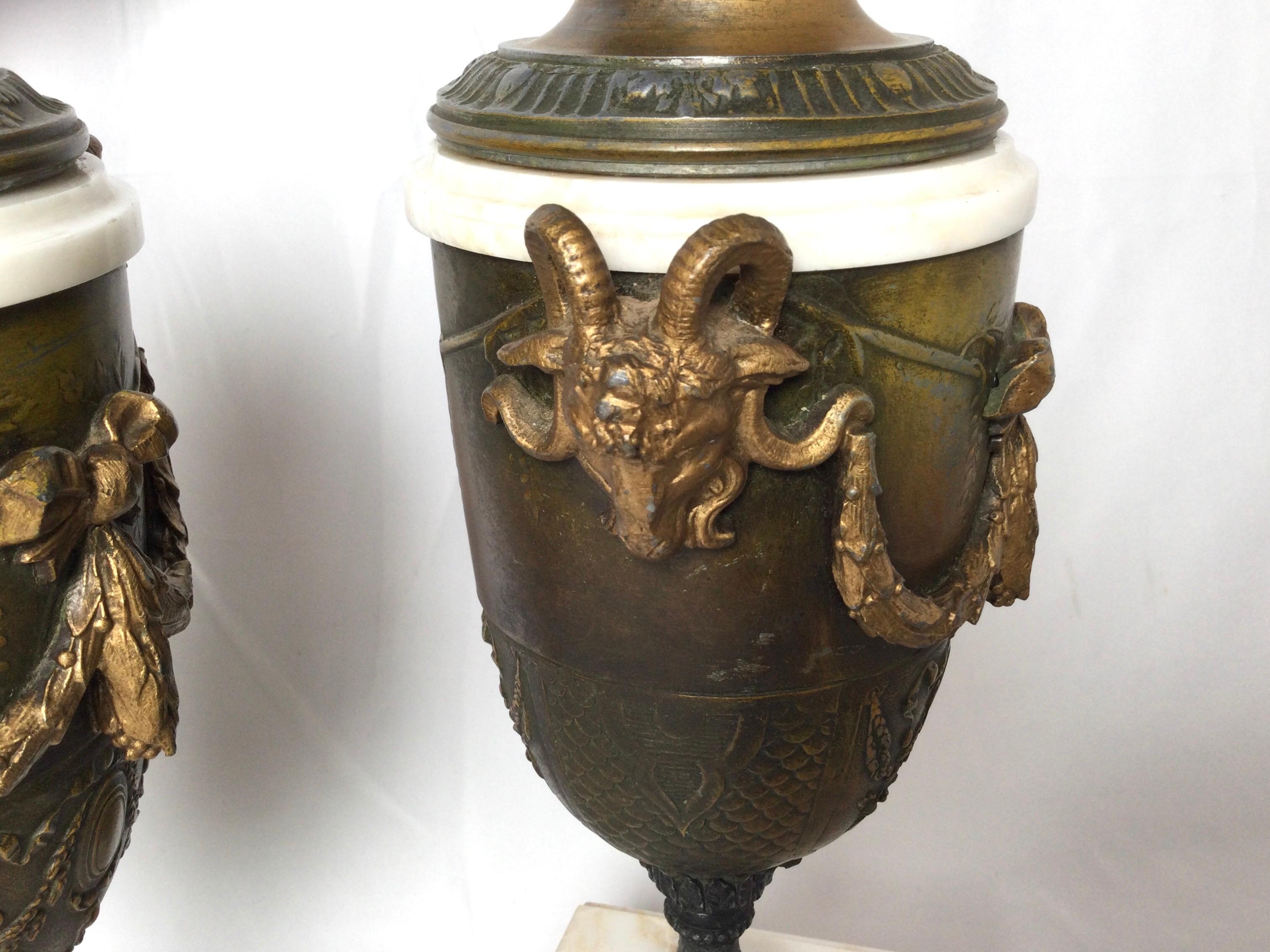 19th Century Pair of French Style Marble and Patinated Metal Garniture Urns with Rams Heads For Sale