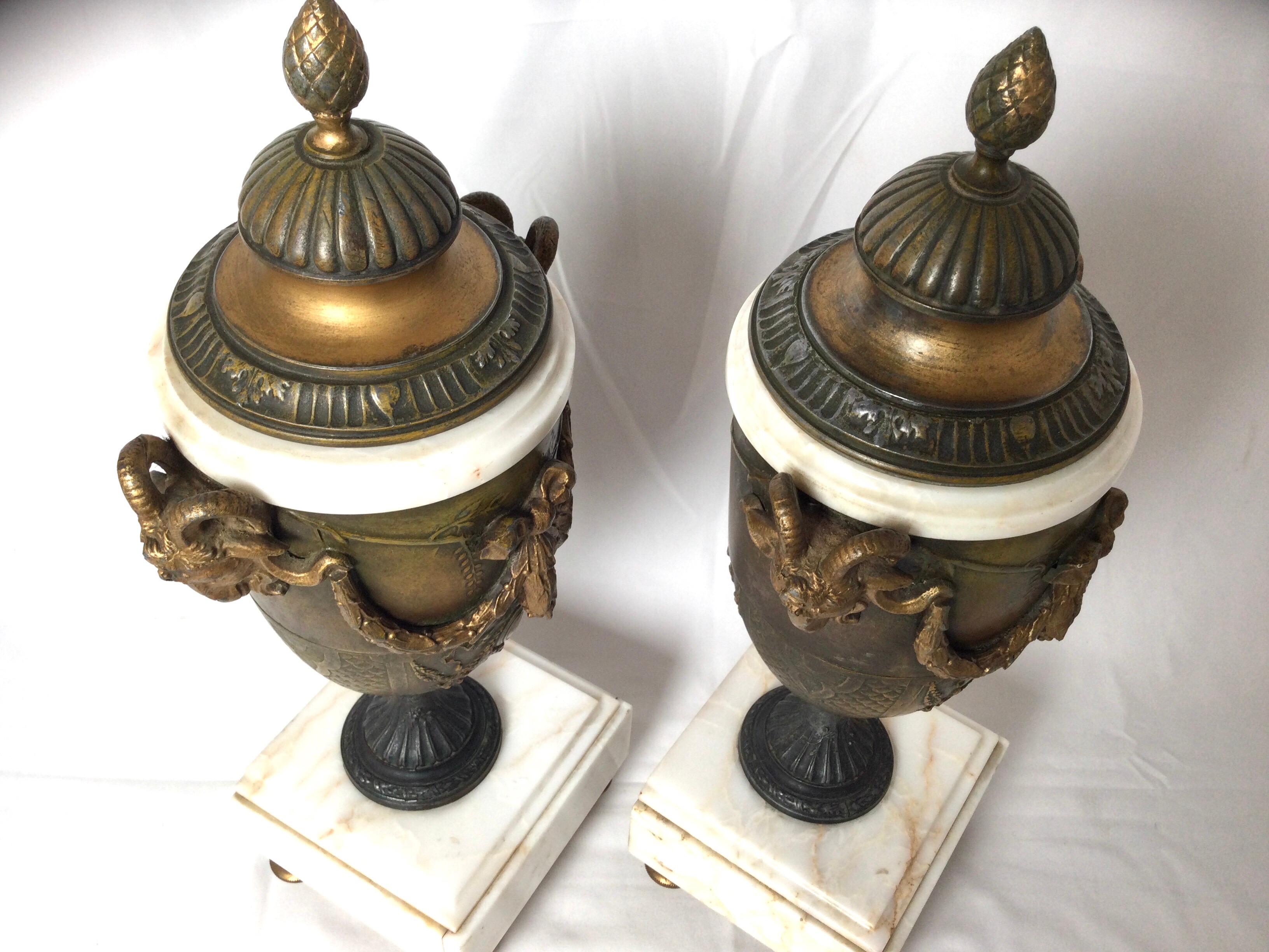 Pair of French Style Marble and Patinated Metal Garniture Urns with Rams Heads For Sale 1