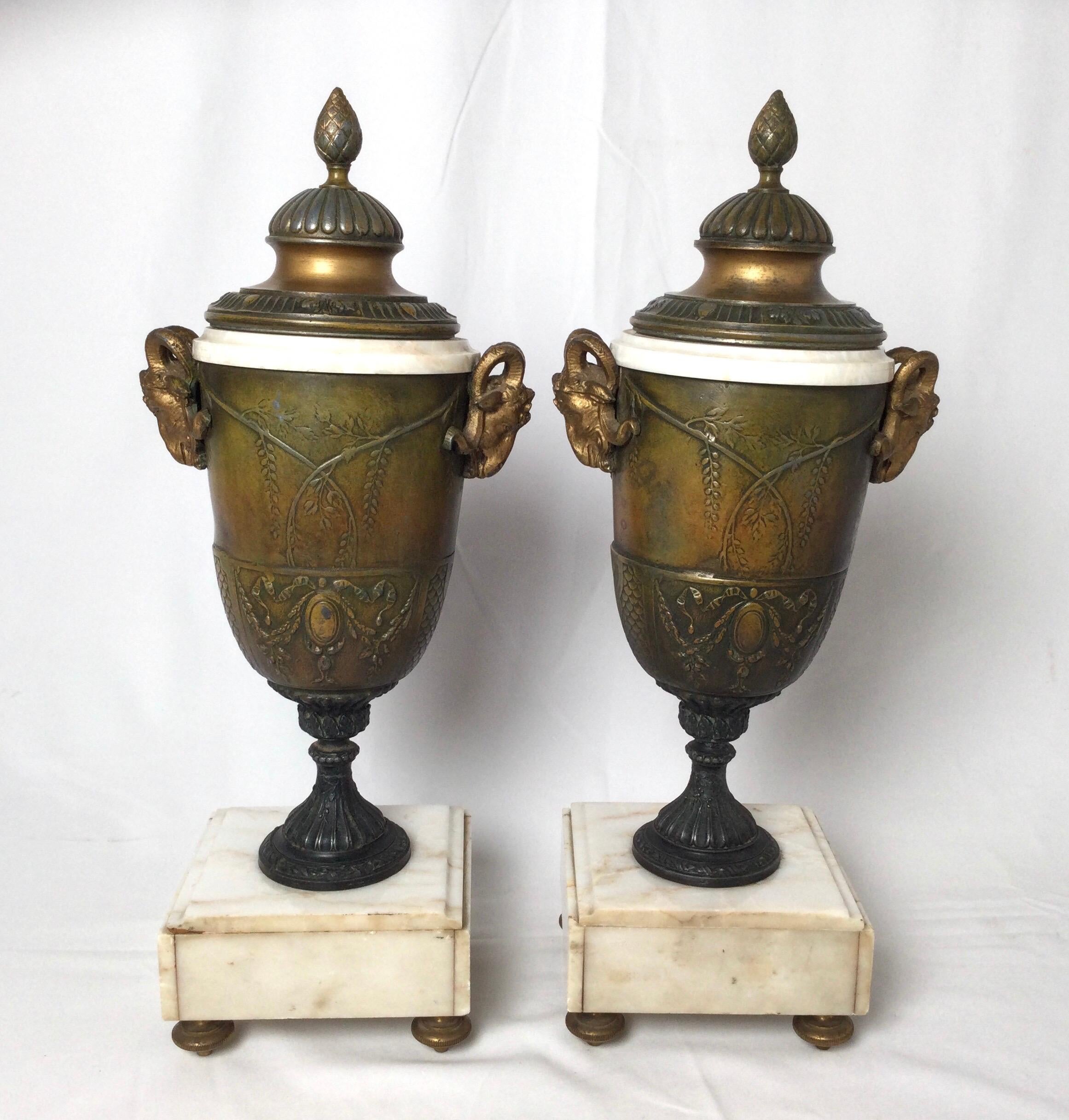 Pair of French Style Marble and Patinated Metal Garniture Urns with Rams Heads For Sale 2