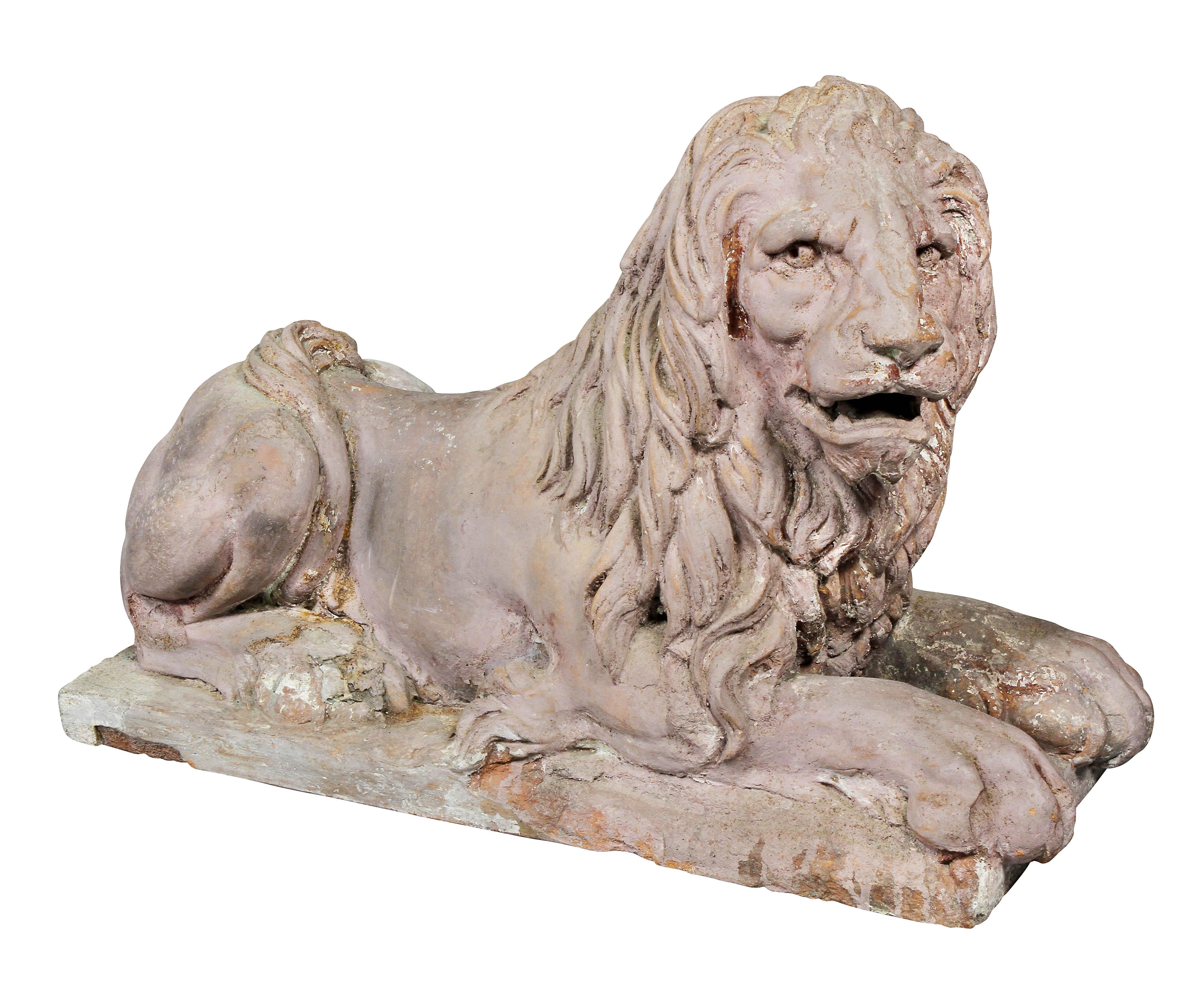 Mid-19th Century Pair of French Terracotta Figures of Crouching Lions
