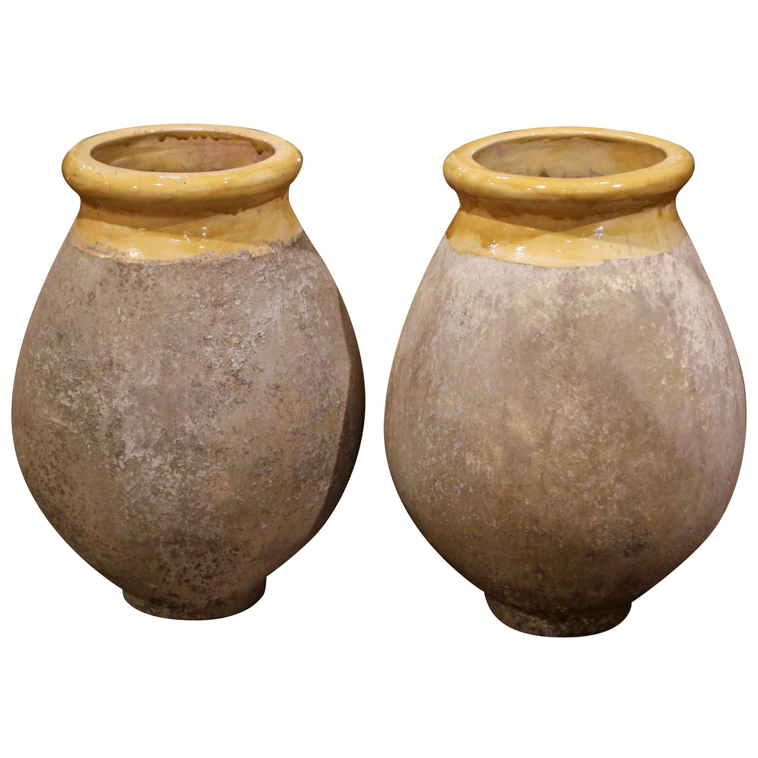 Pair of French Terracotta and Yellow Glazed Olive Jars from Provence