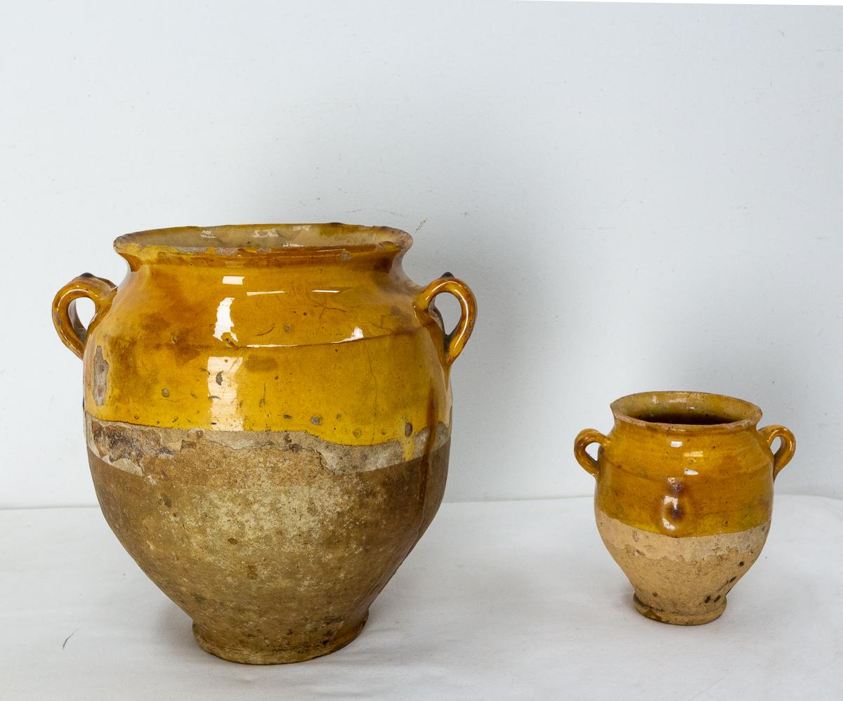 Pair of French terracotta confit pot
Traditional large earthenware pottery confit pot from South West France with yellow glaze
This vessel was used from the 19th to the mid-20th century to conserve food
Very decorative
Good patina and bright